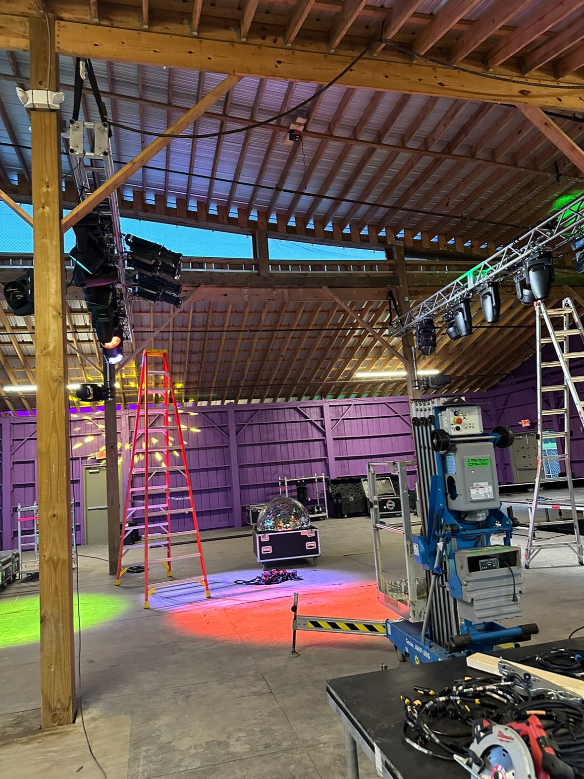 Installing lights and disco balls at House of Yes!
