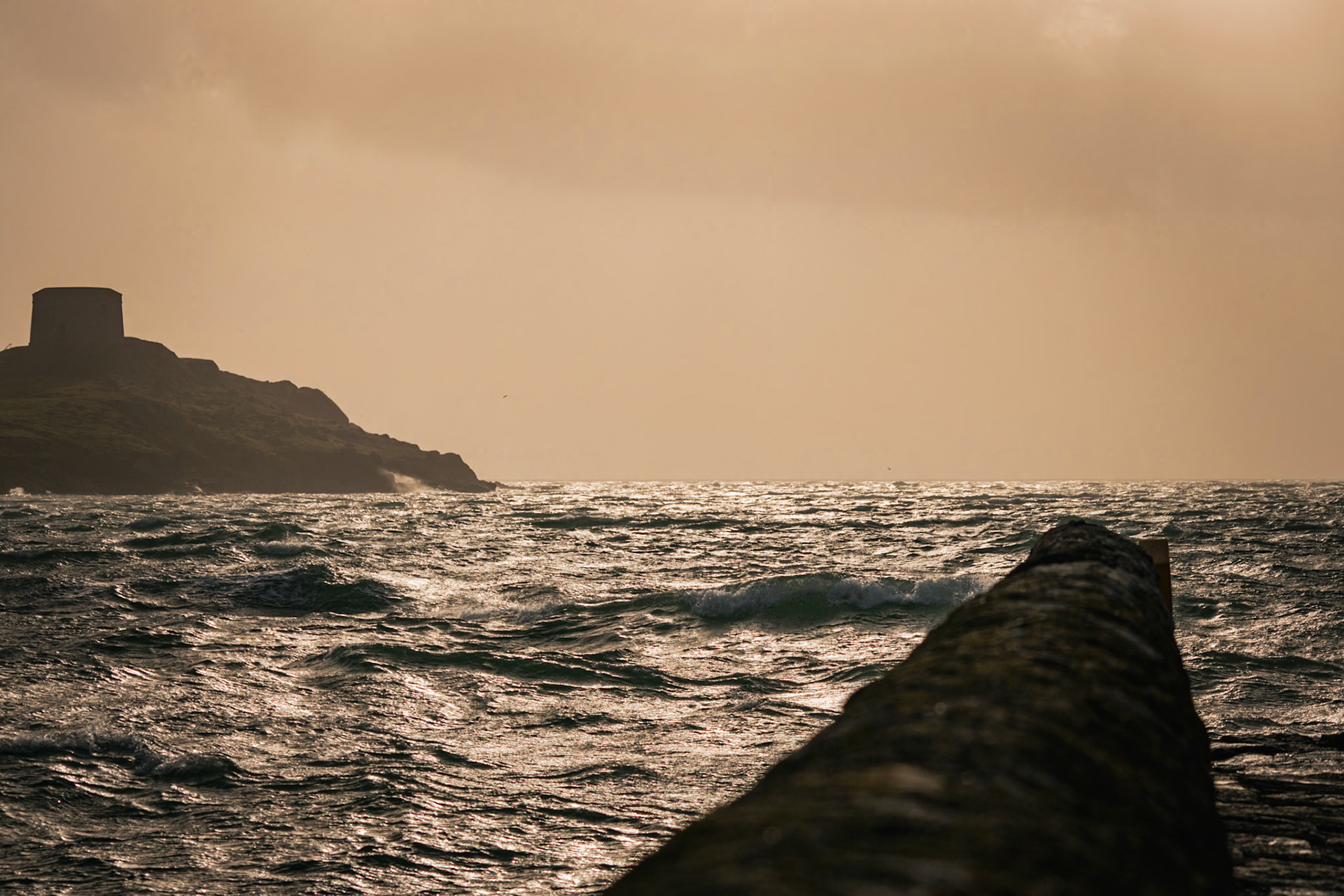 The raw, unyielding power of the Atlantic as ex-Hurricane Ophelia made landfall, turning the quiet eastern coastline into a wall of crashing spray.
