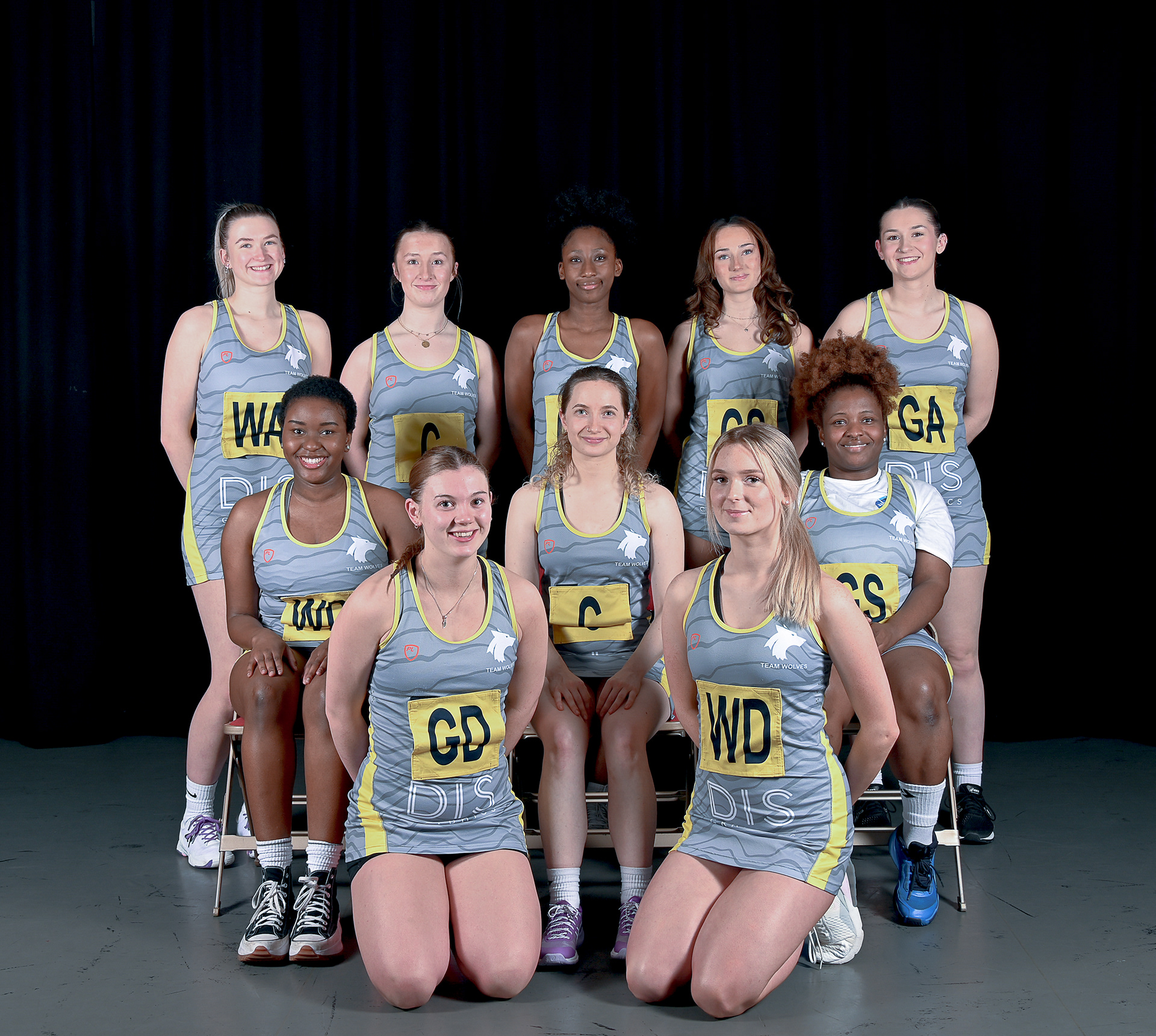 A group of young women in sports attire