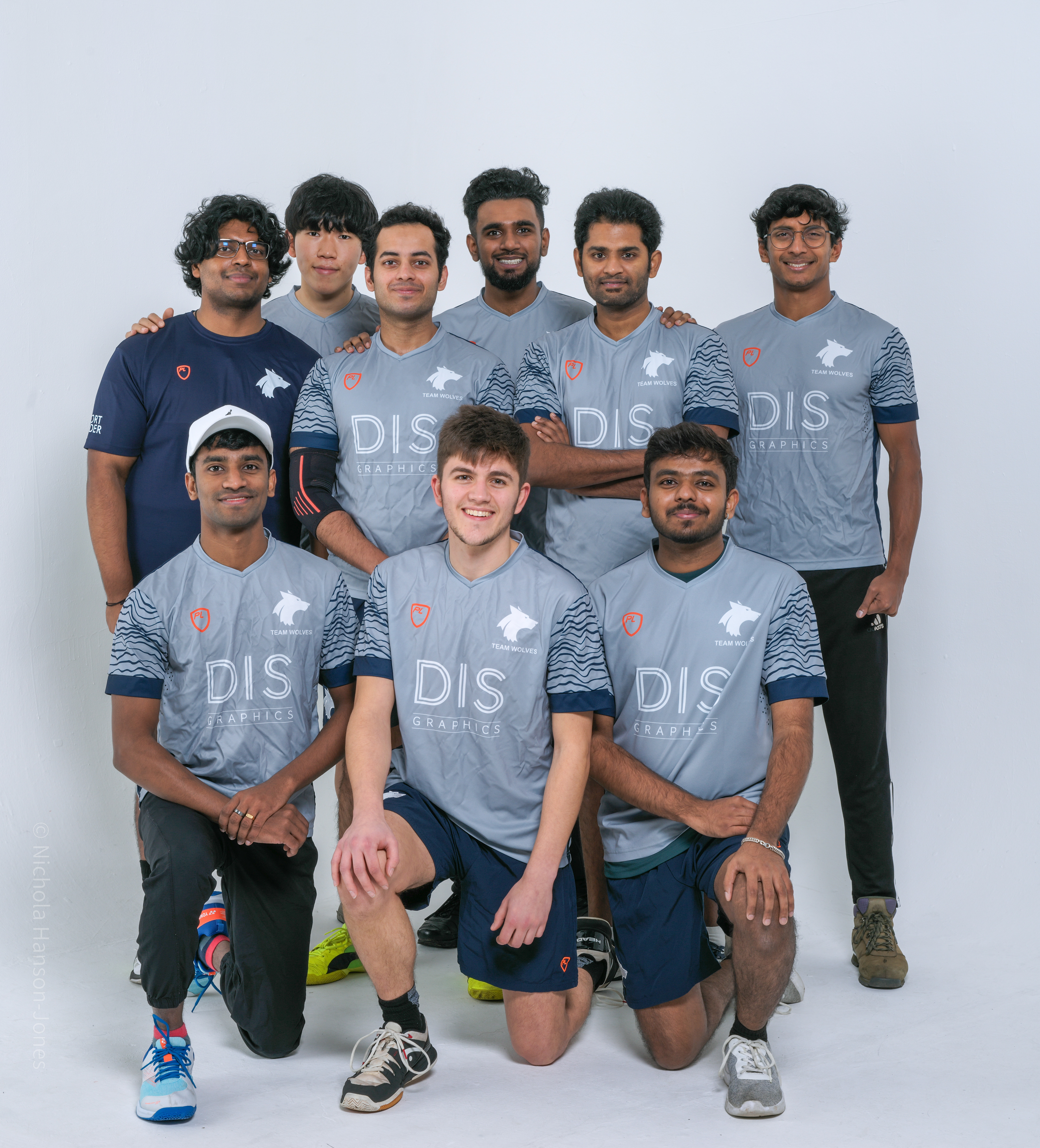 A group of young men in sports attire