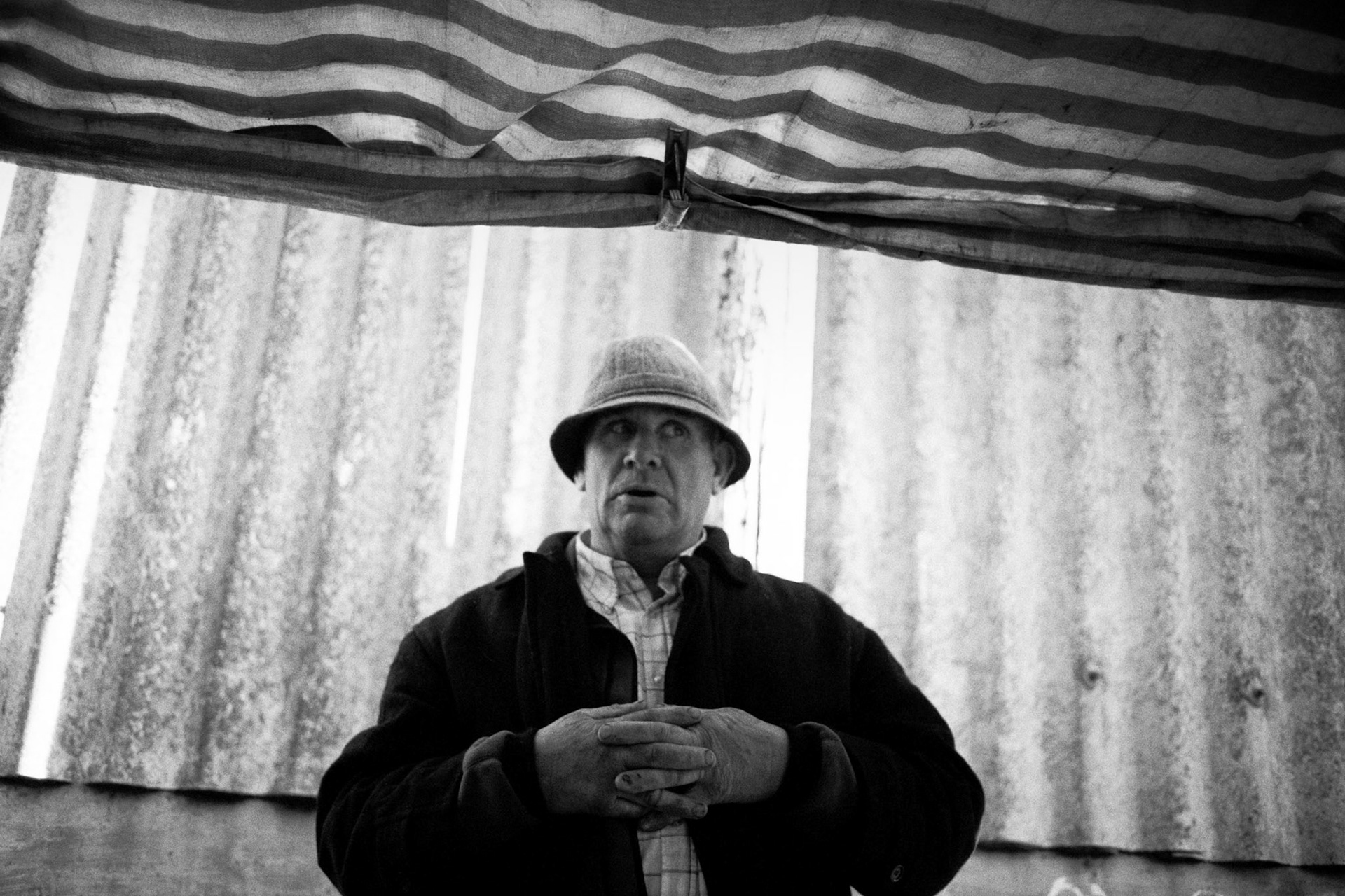 George Price on his fruit, veg &amp; clothing stall. Abergavenny Livestock Market, December 2013.