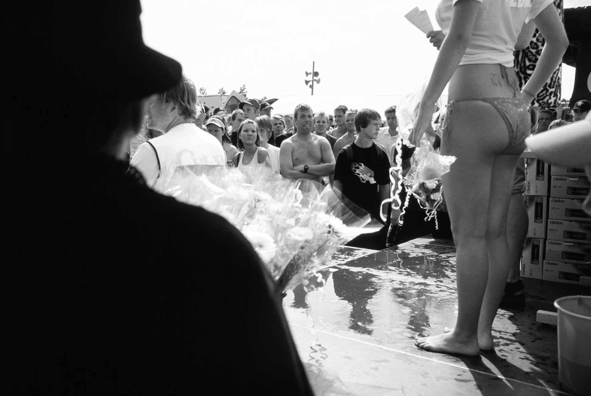 Bikini girl.Gatebil Street Racing Event, Rudskogen, Norway.'Gatebil' (Direct translation = Streetcar) drivers bring theircustomised cars along to a track day in Norway to hang out, look at each others cars and girlfriends and drive round the track doing skids for their own enjoyment and the crowd.