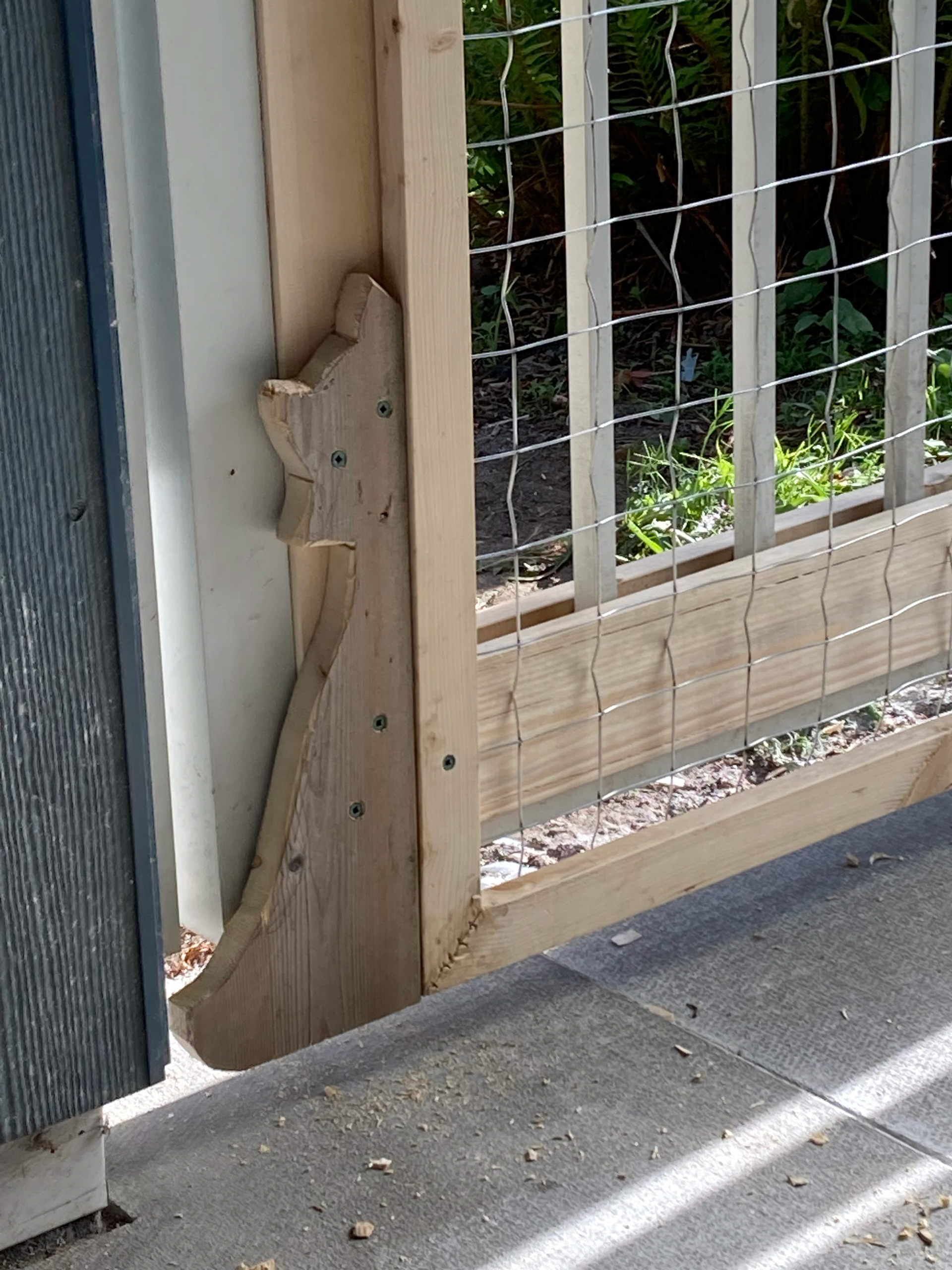 If you have to create an awkward little barrier to close an awkward little escape route, you might as well have fun with it.