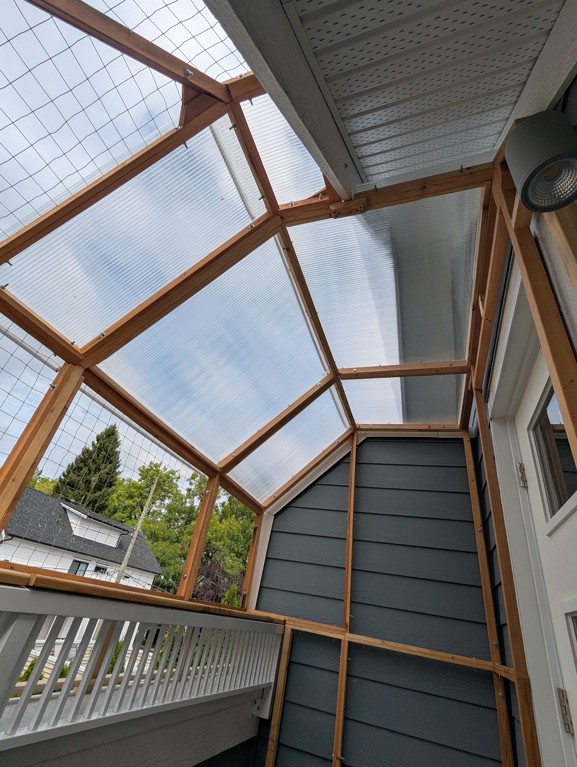 Polycarb roofing material will keep things snug.