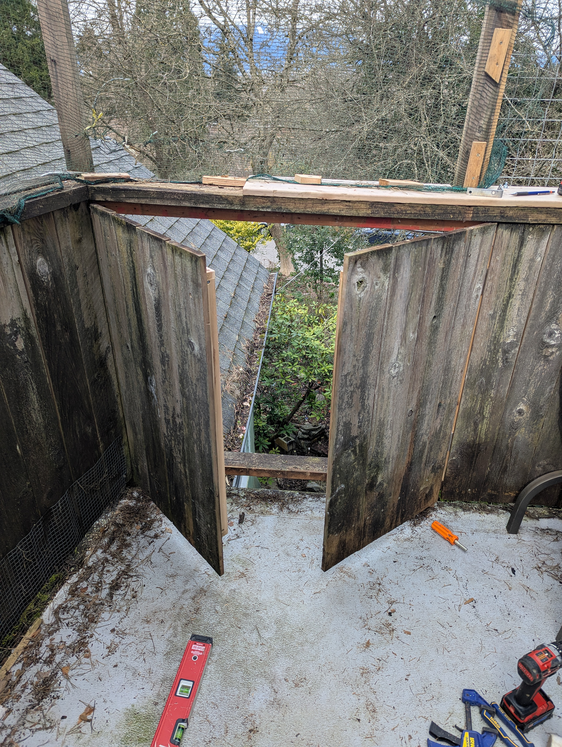 I included a hatch and pulley system so I can lower down massive buckets of pine needles rather than having to carry them through the house. We get a LOT of pine needles in the catio.