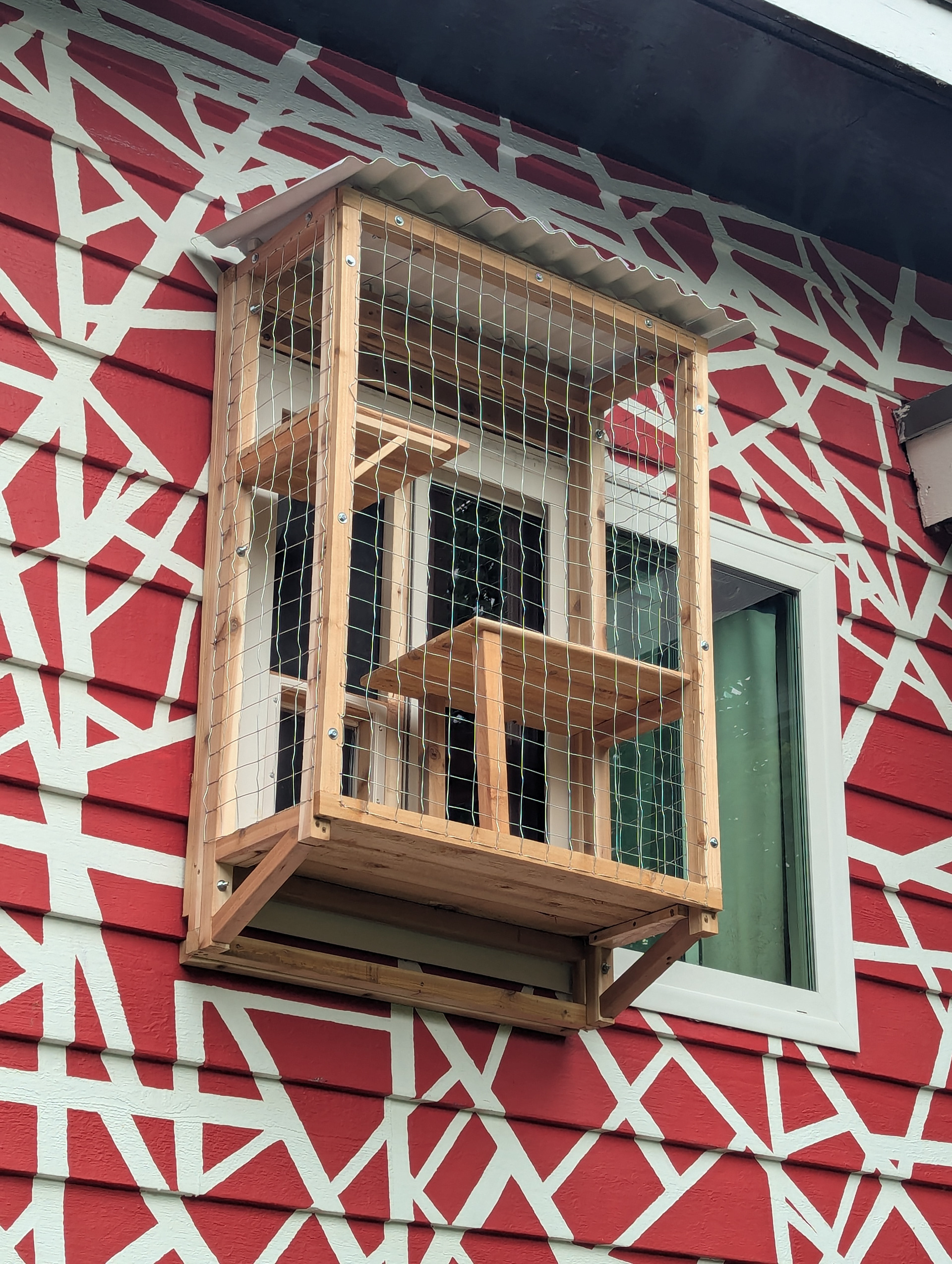 The box is hung on a cleat so can be taken down if necessary with minmal effort.