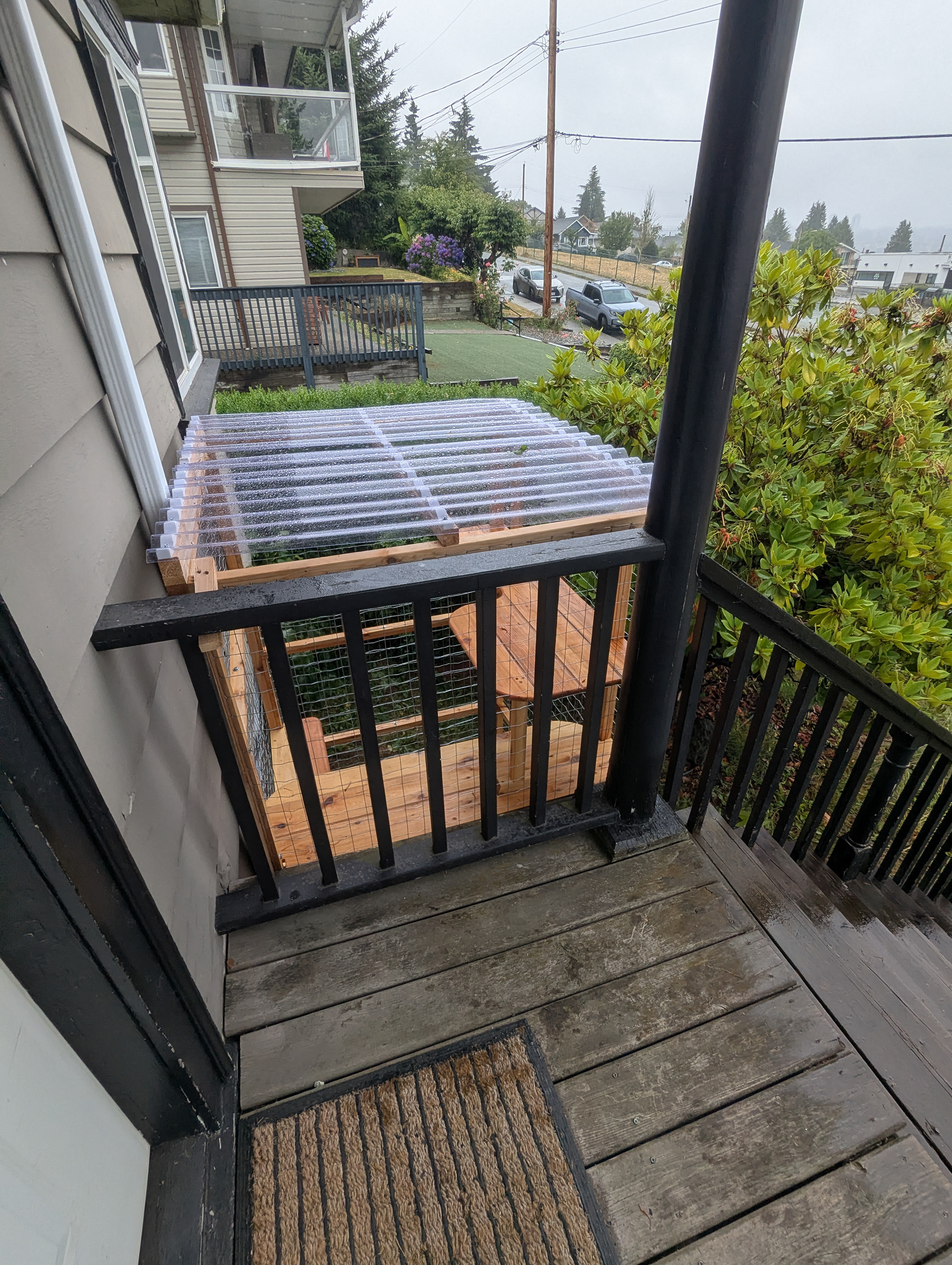 Unfortunately in this household, the cats live in a separate space from a rambunctious dog. We came up with this solution for some safe exposure therapy.
