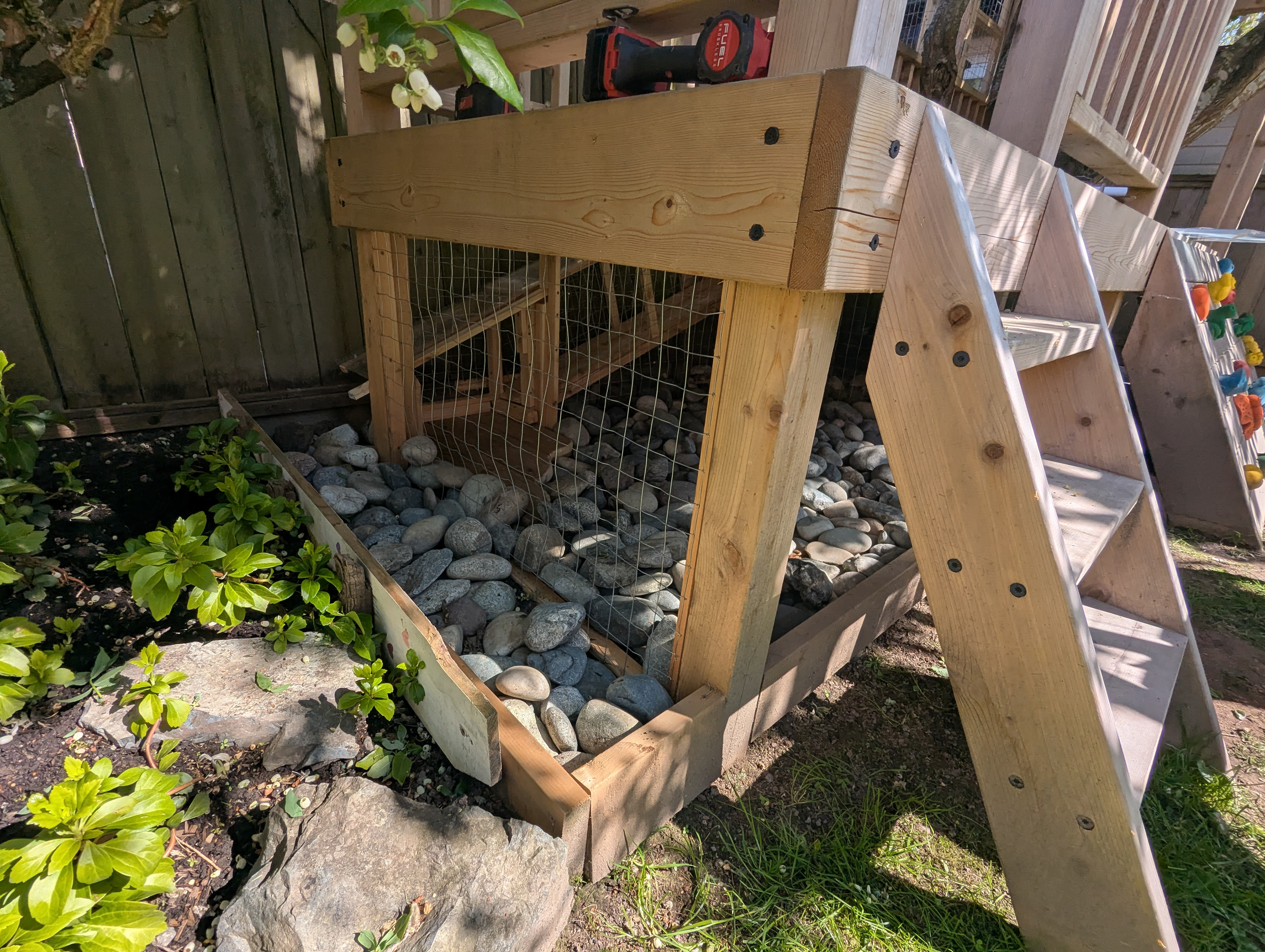 The space underneath the play structure was enclosed for Paco. 
