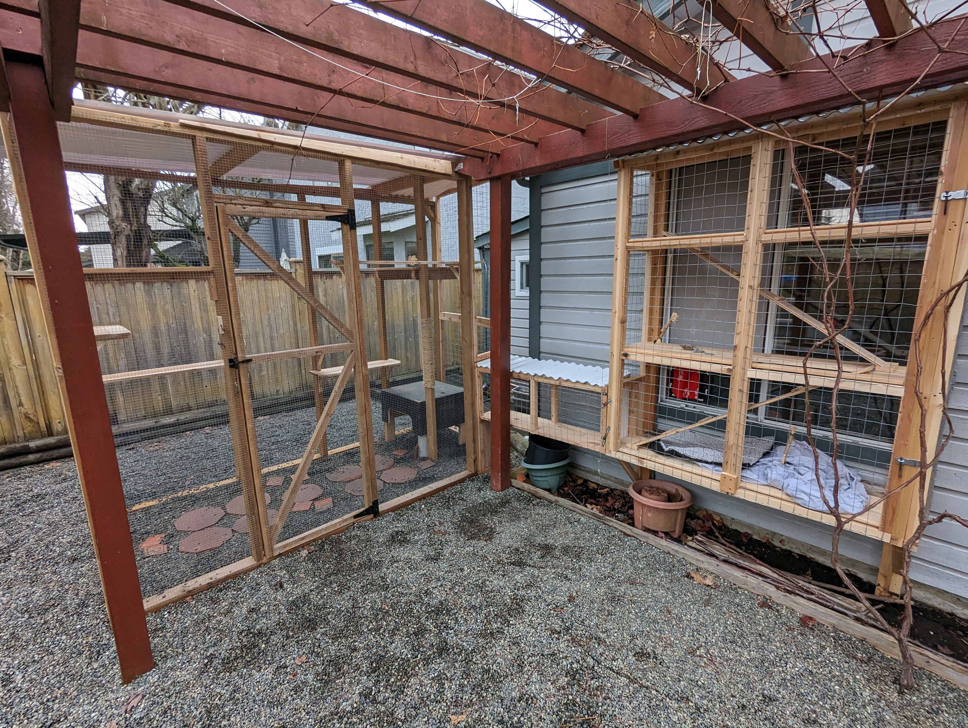 Elizabeth sourced the structure on the left through Facebook Marketplace — we helped modify, design and build the window box, connector tunnels, and lookouts