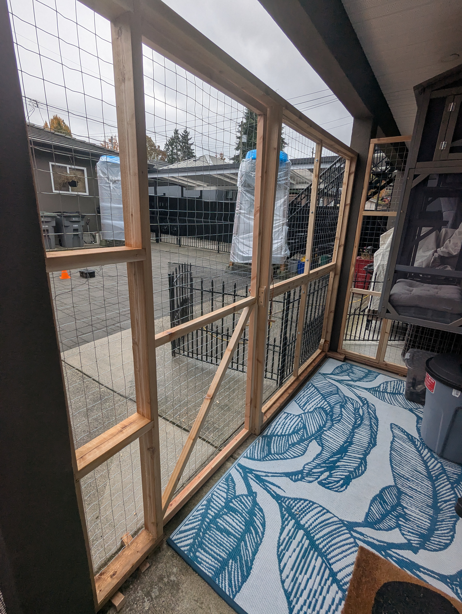 The area outside the human's entrance door needed to be enclosed, as Pippa's capabilities grew.