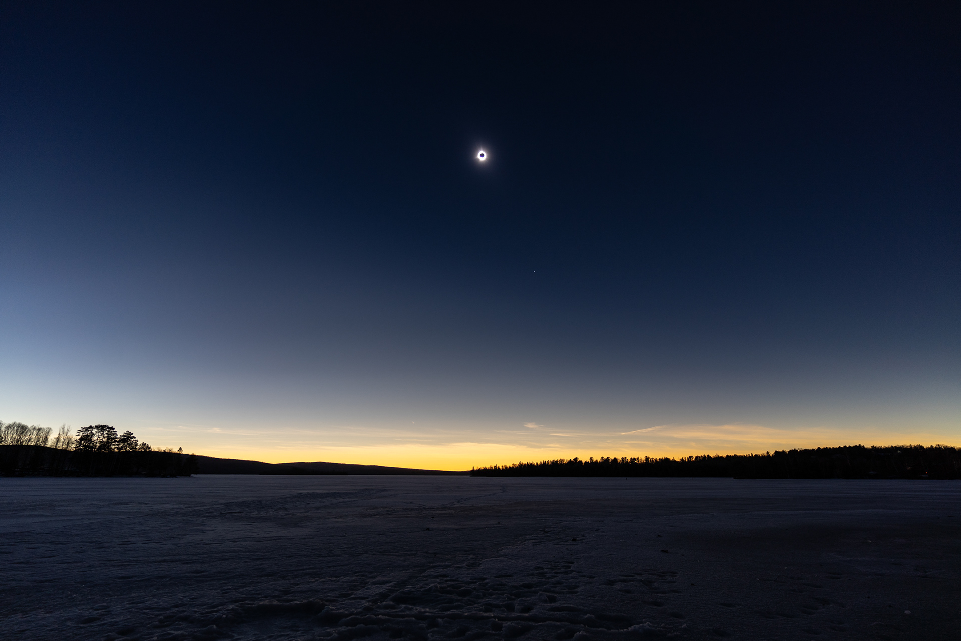 Rangeley Lake seen from Rangeley town beach during totality