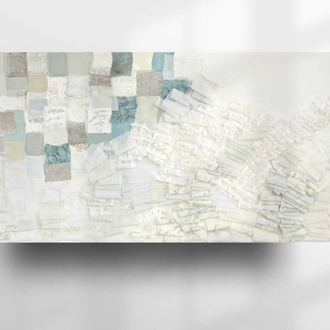 Full view of a textile mixed media art: Vibrant patchwork of seafoam-inspired colors and textures on a flat watercolor page. Soft-edged squares in coastal hues of sandy yellows, misty blues, moss greens, and subdued turquoise. Various art materials, including gouache pigments, pearls, linen, and sheer cotton fabric and paper adorned with handwritten Persian poetry.