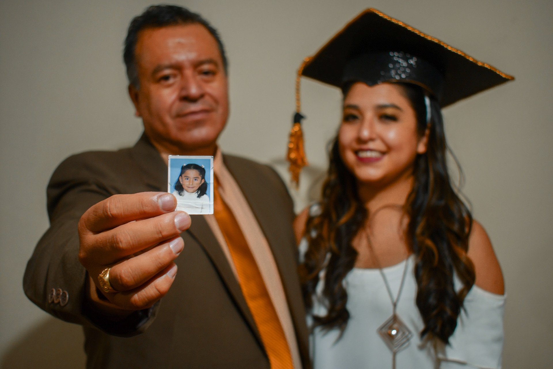 El orgullo que siente un padre al ver a sus hijos realizar sus metas.