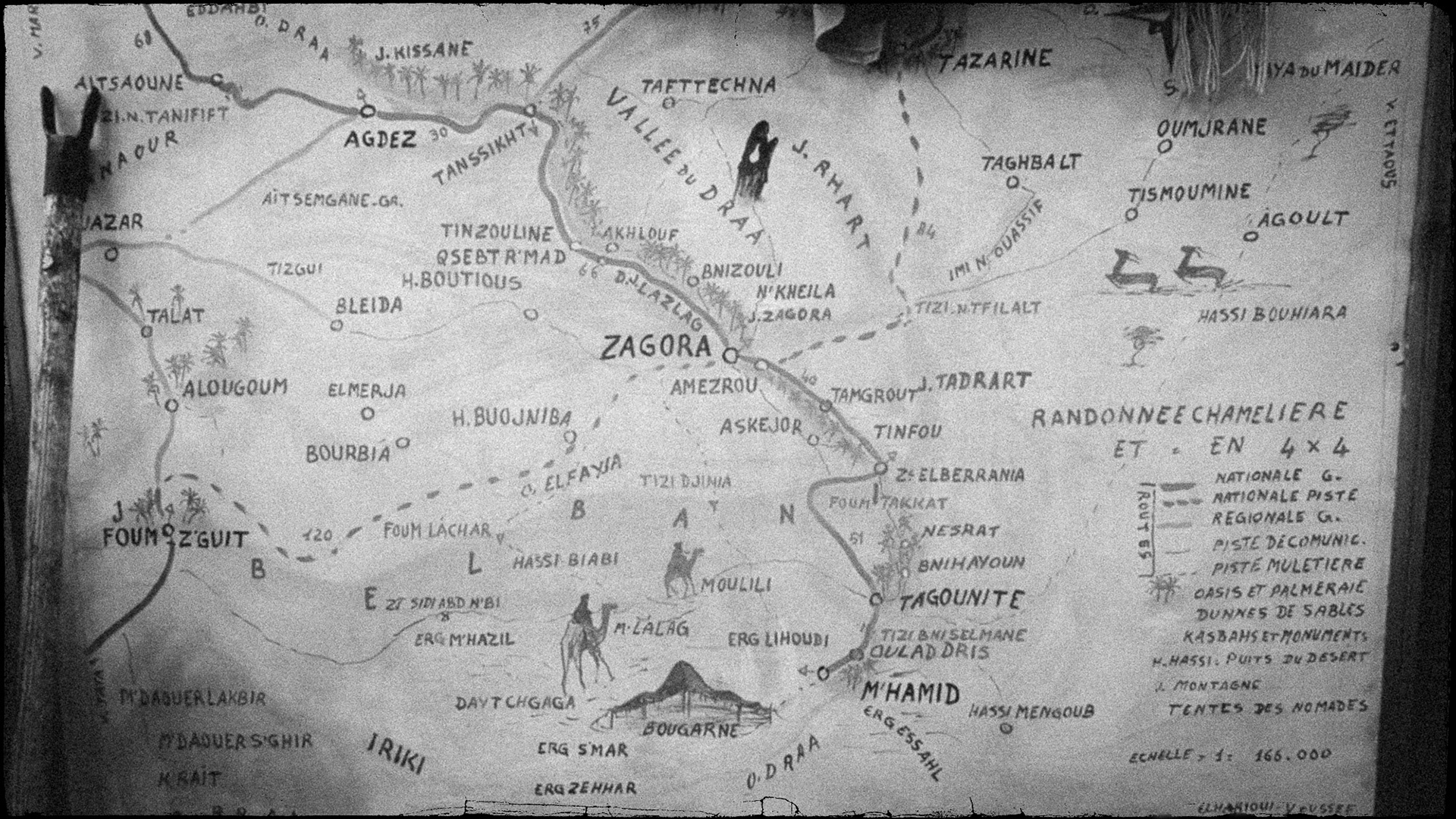 A handmade map with illustrations of the area around Zagora photgraphed in black and white