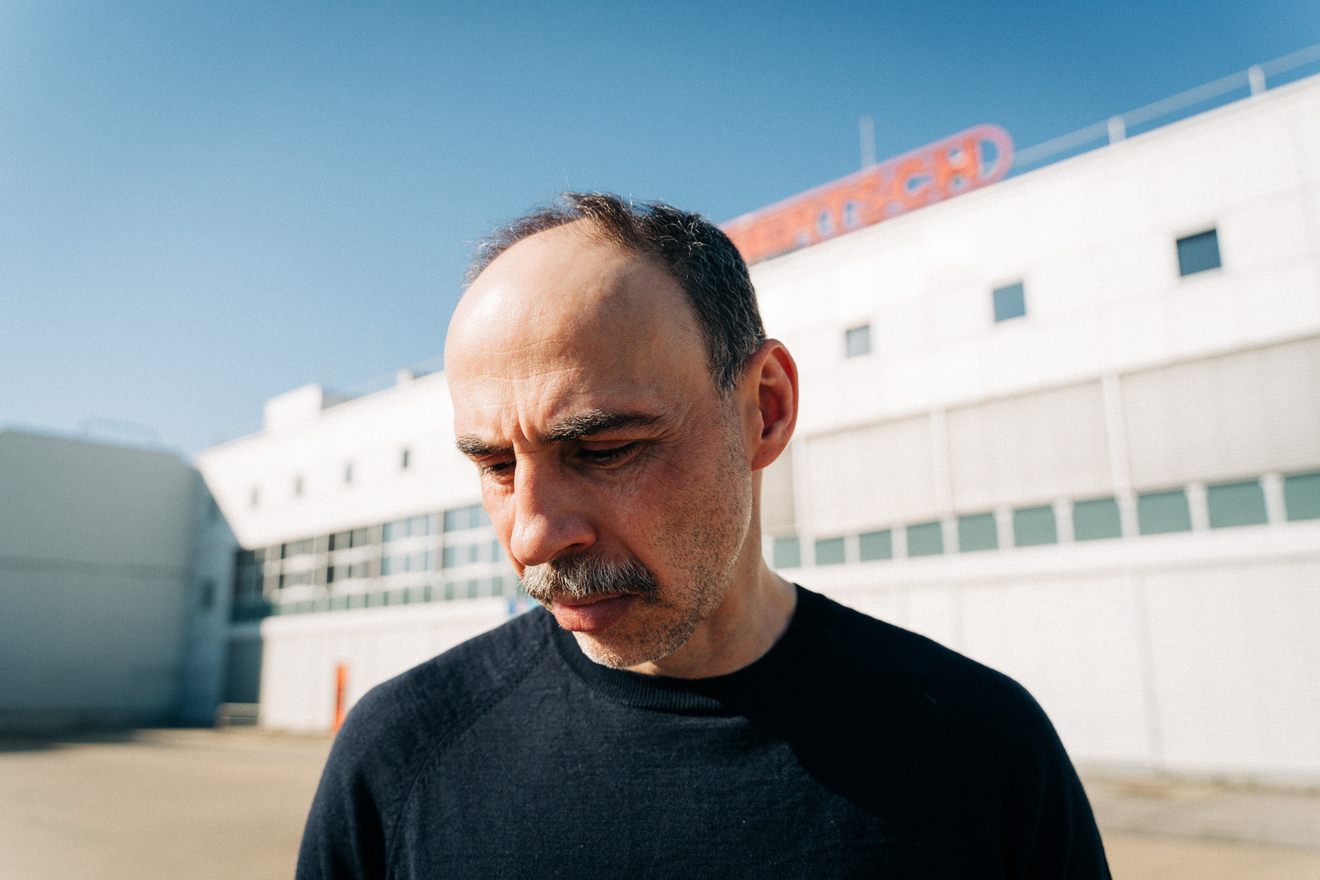 Actor Florian Tröbinger photographed against an urban backdrop