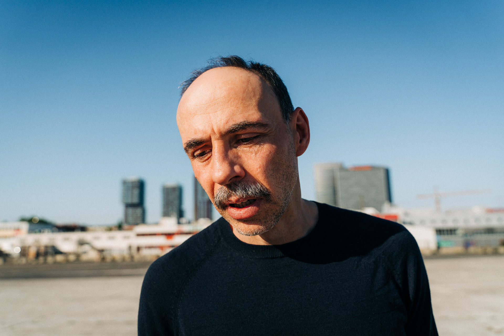 Head shot of actor Florian Tröbinger taken at a slight Dutch angle