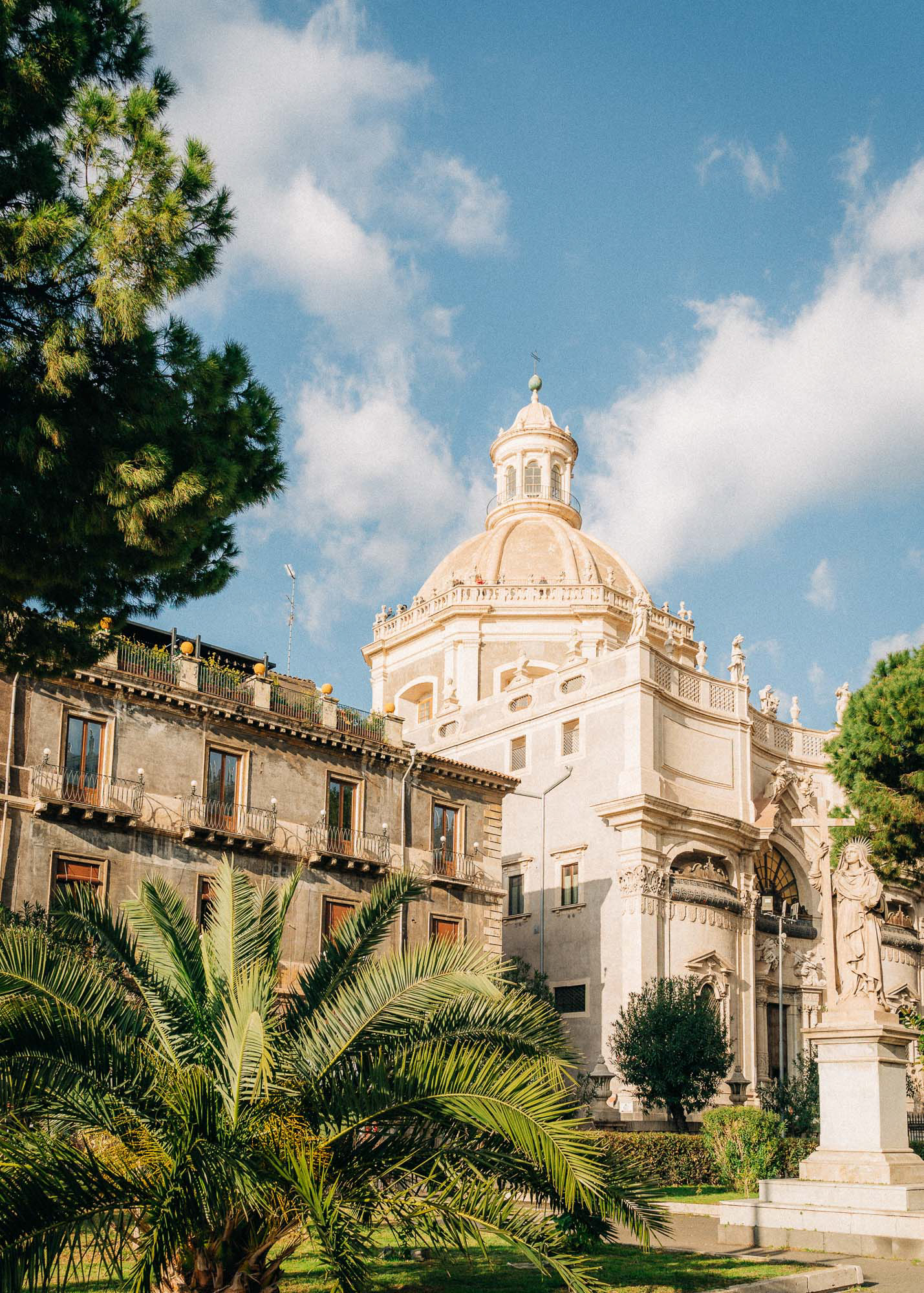 Badia di Sant'Agata photgraphed in bright sunlight surrounded by plants