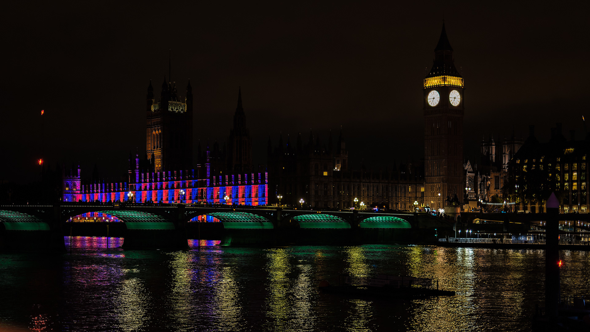 London, River Thames, Palace of Westminster, Westminster Bridge. View from the south bank at night.