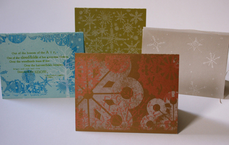 series of snowy themed holiday cards