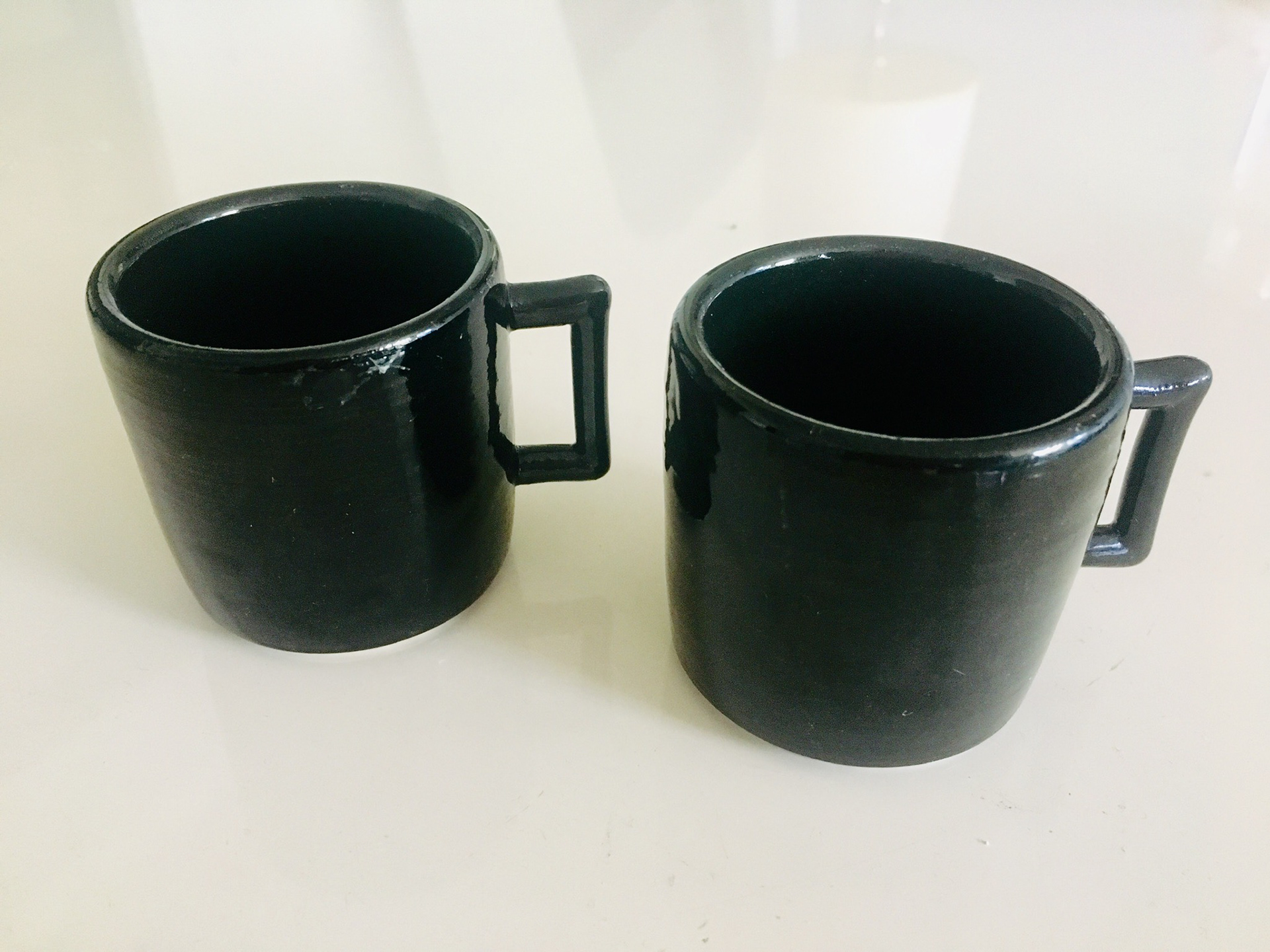 hand made espresso cups from a non-profit pottery school in the East Village