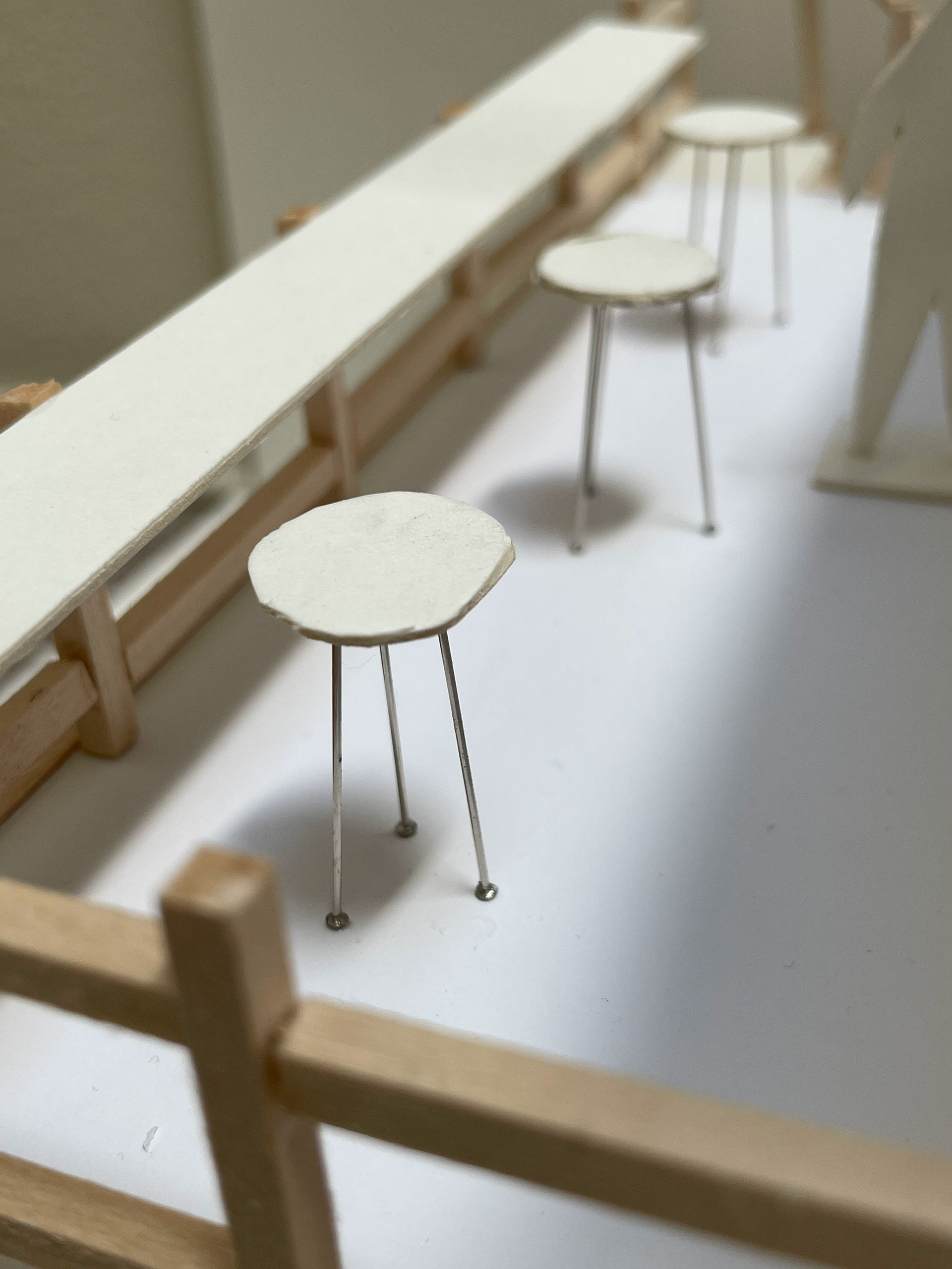 I used needles to create bar stools