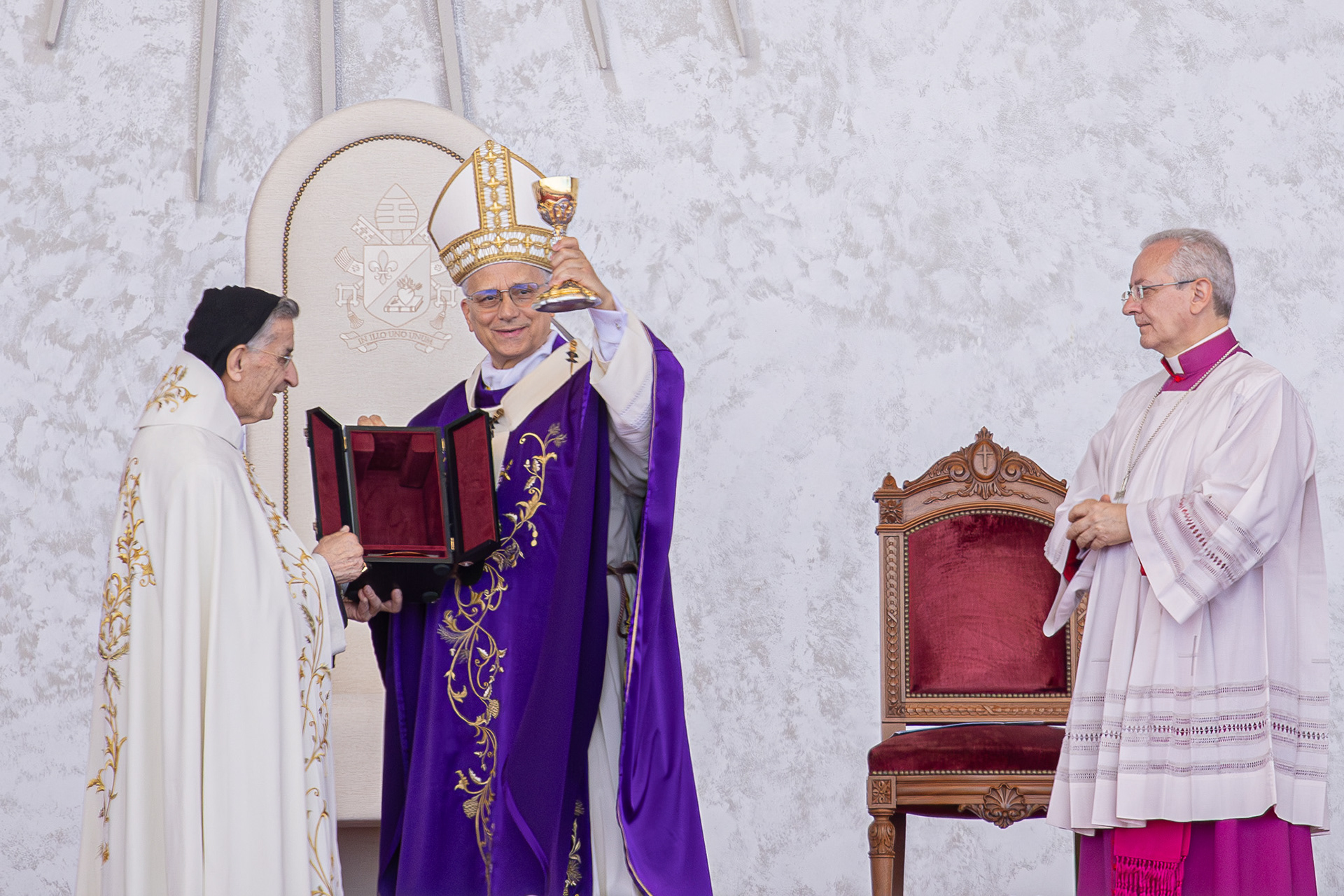 Maronite Patriarch Bechara Boutros Al-Rai receives a chalice from Pope Leo XIV during a Holy Mass at the Waterfront in Beirut, marking the Pope’s first apostolic journey. Photo by: © Marek Ladzinski/ZUMA Press Wire