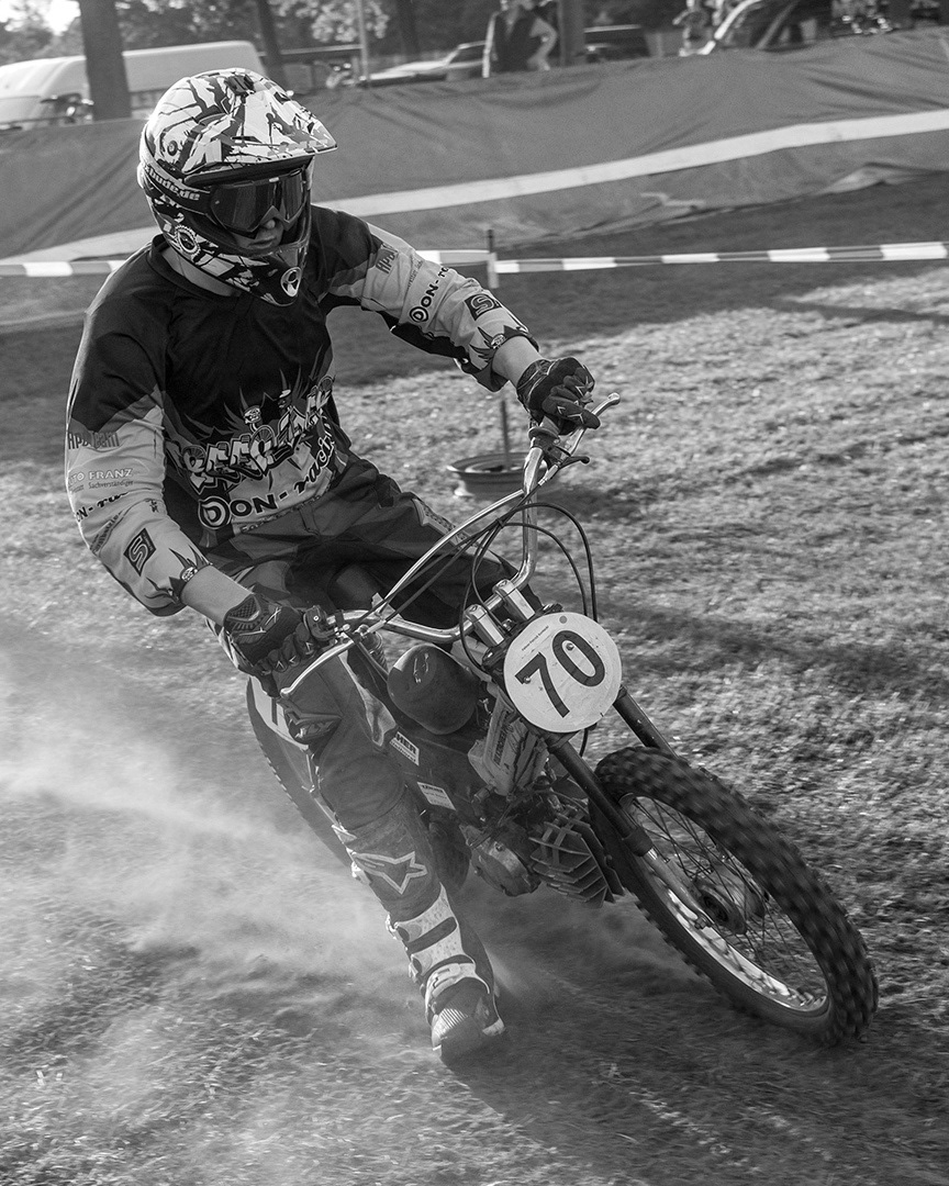 Rider in a small-mopde race