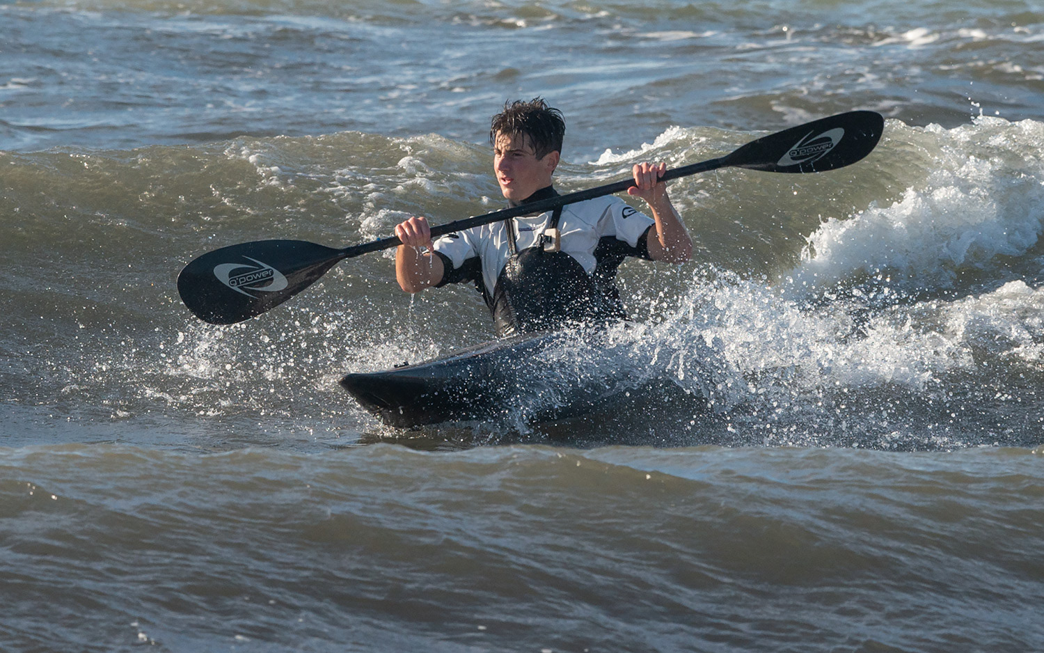 Kayaker training in the sea