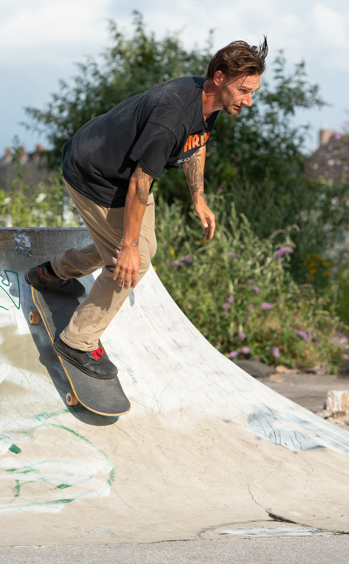 Skateboarder dropping in from a volcano