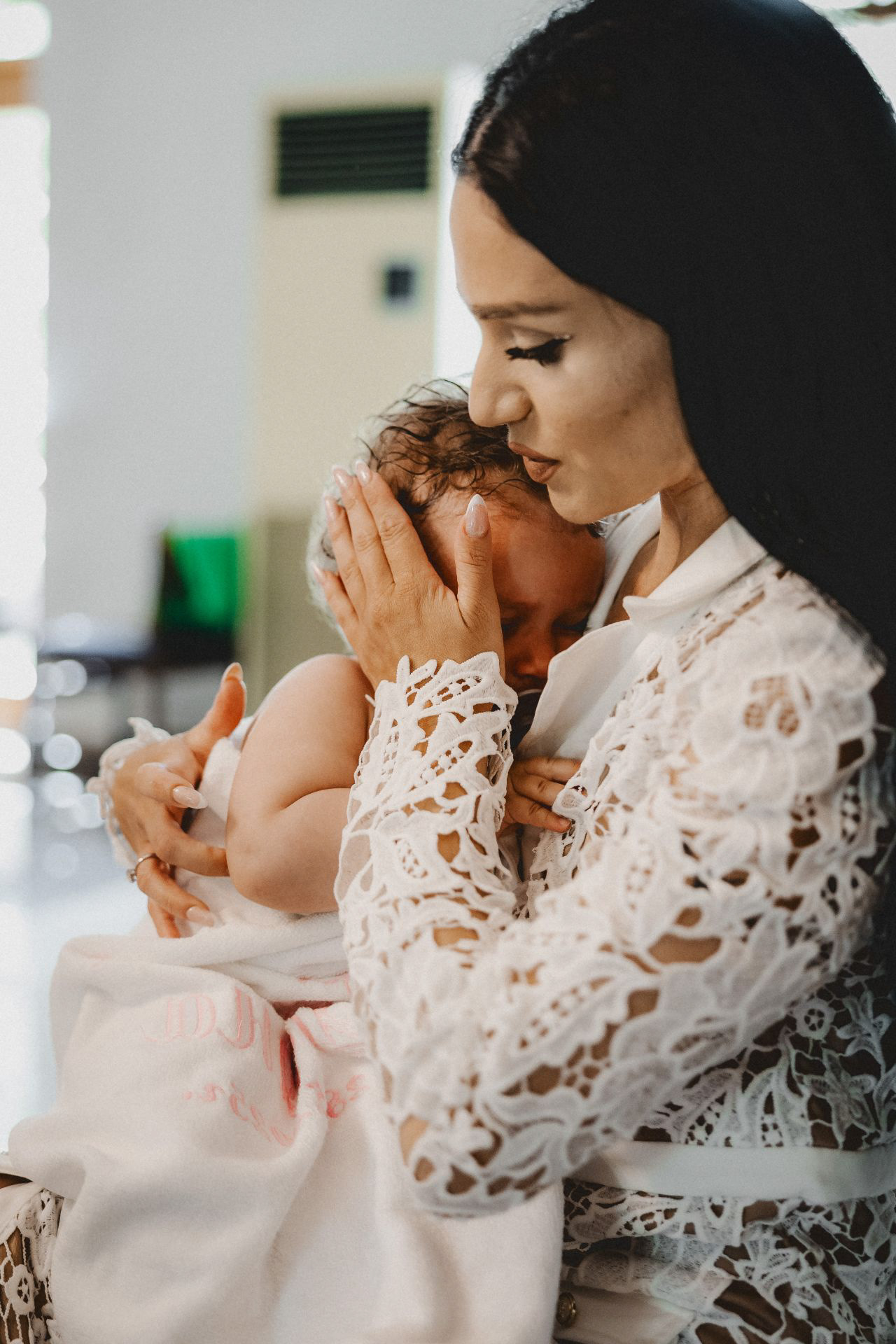 Професионален фотограф за снимки в Поморие за ритуал по свето кръщение