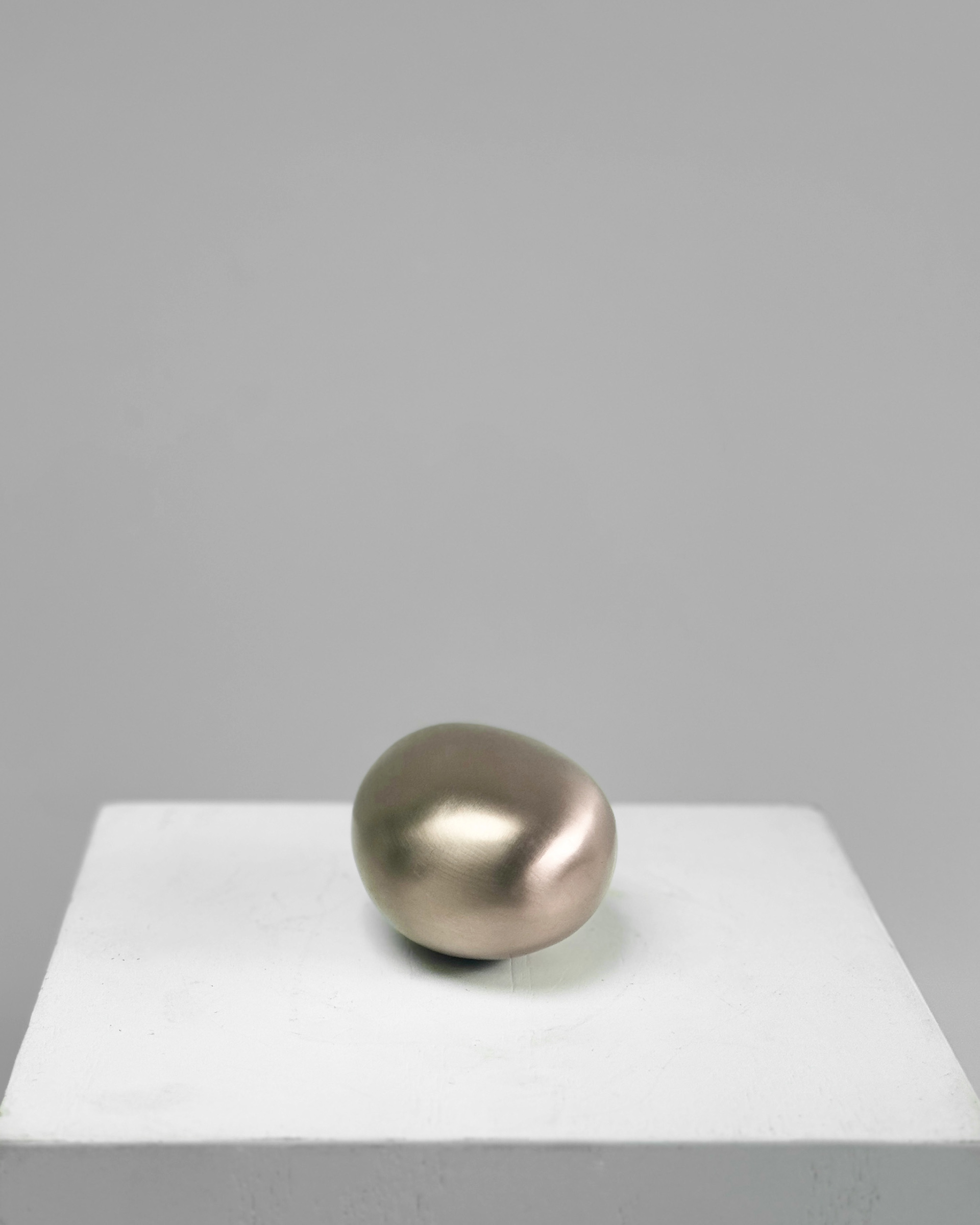Lithic, 2026. Lost-wax cast bronze sculpture by Kendall Conrad, 4 × 2 × 3 in.