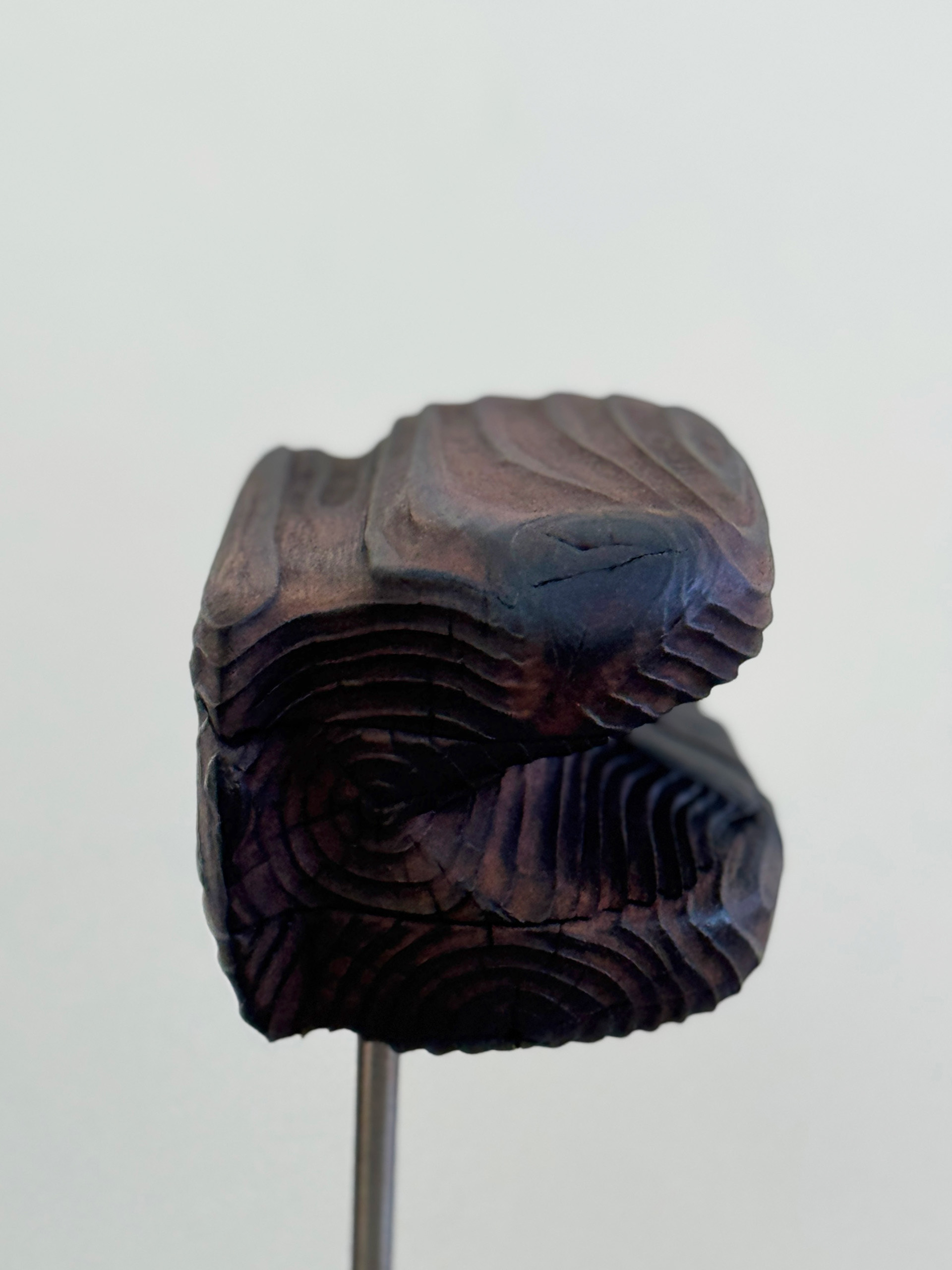 Folded Strata, 2025, charred, laminated redwood by Kendall Conrad — alternate view.