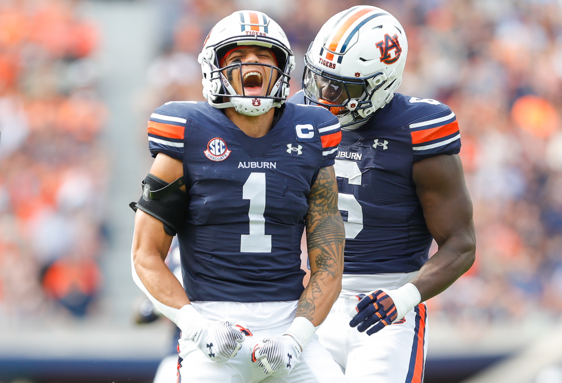 Auburn, AL - Auburn Safety #1 Jerrin Thompson celebrates with teammate Linebacker #6 Austin Keys after a sack against Vanderbilt on November 2nd, 2024 in Pat Dye Field at Jordan-Hare Stadium.