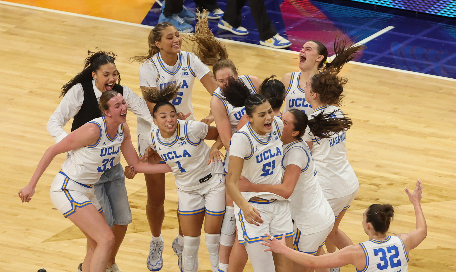 Phoenix, AZ - UCLA Womens basketall team storms the court after defeating the South Carolina Gamecocks 79-51  in the womens national championship game at Mortgage Matchup Center in Peoenix Arizona on April 5th, 2026