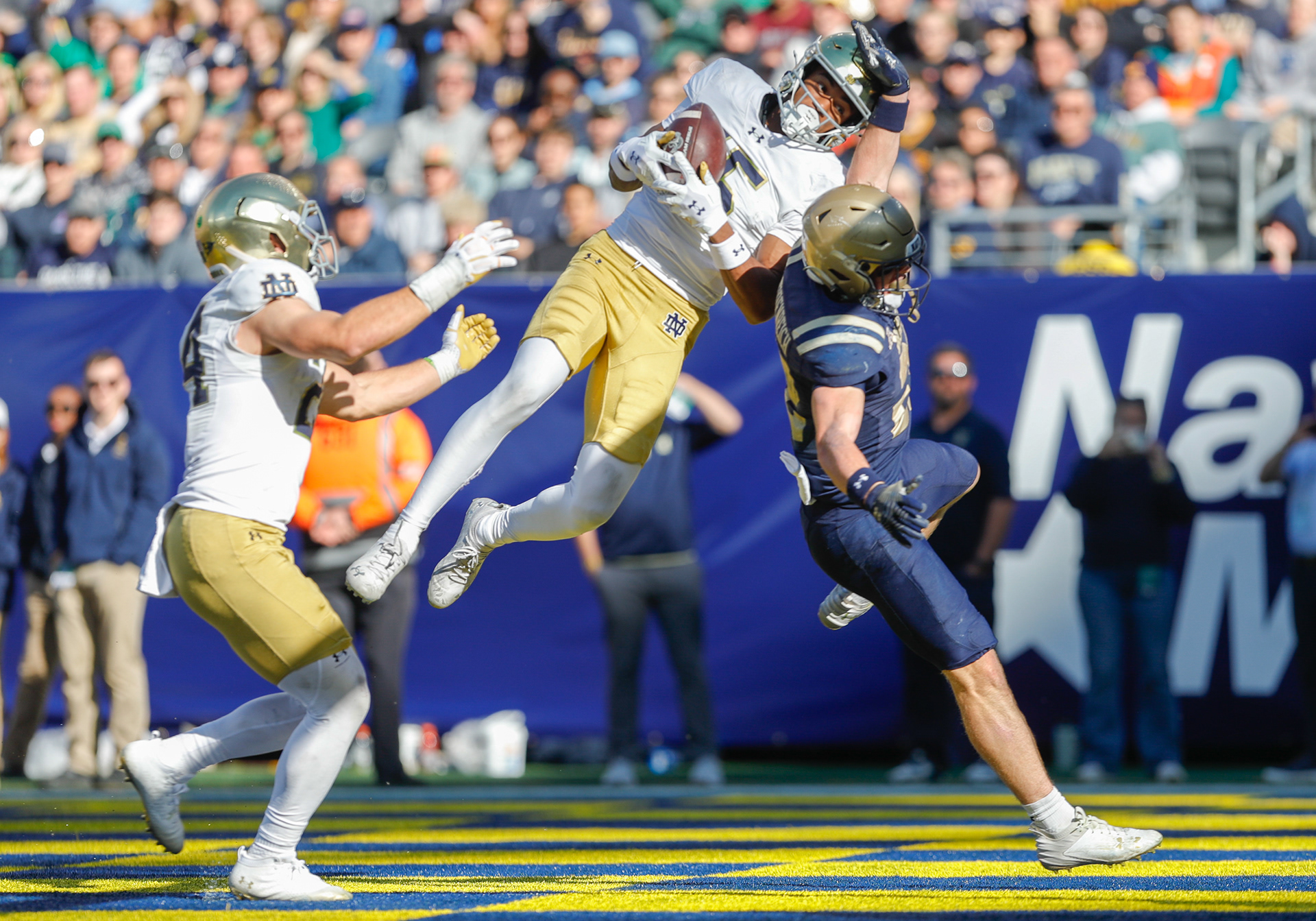 East Rutherford, NJ - Notre Dame Cornerback #15 Leonard Moore intercepts the ball in the Navy end zone on October, 26th, 2024 at MetLife Stadium.