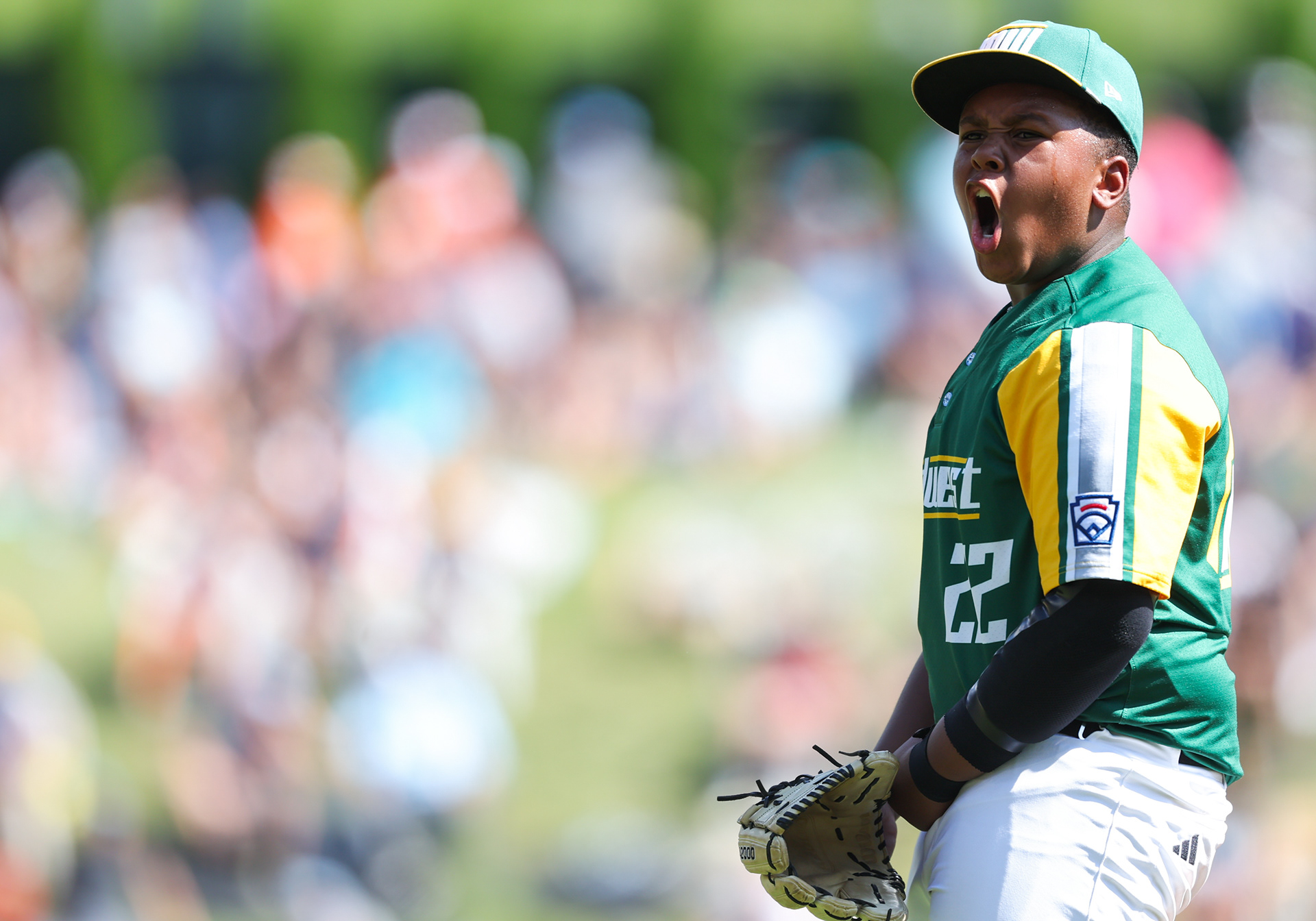 Williamsport, PA - Anthony Johnson Jr. #22 who is reprenseting the Midwest region (Davenport Northwest Littleleaguem, Iowa) in the Little League Worldseries '26 celebrates getting a strikeout to end the innning against the Metro region (Bayonne Central Little League)