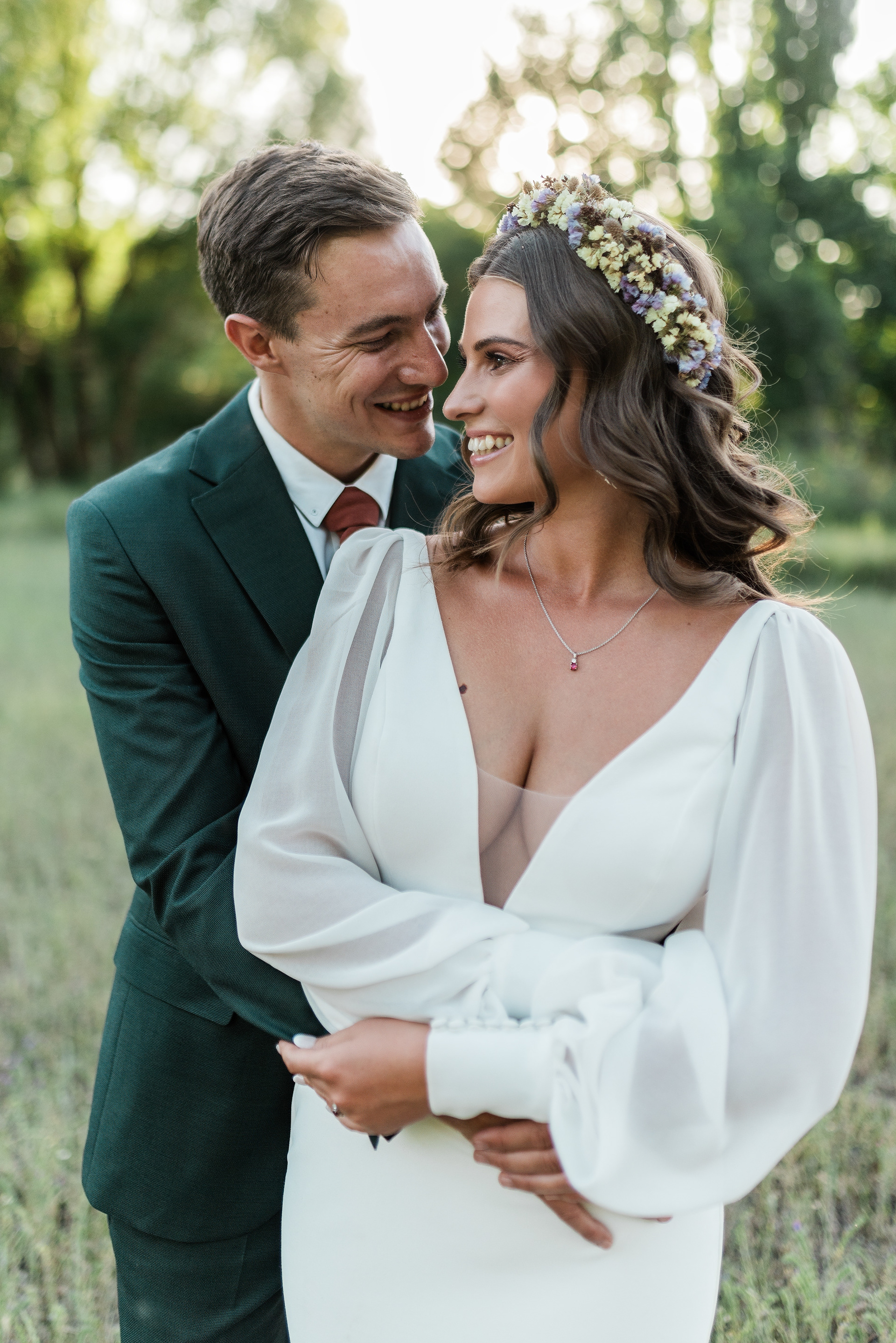 Alexi and Max celebrating their intimate wedding in Wartrail, Eastern Cape countryside with mountain views and natural elegance.