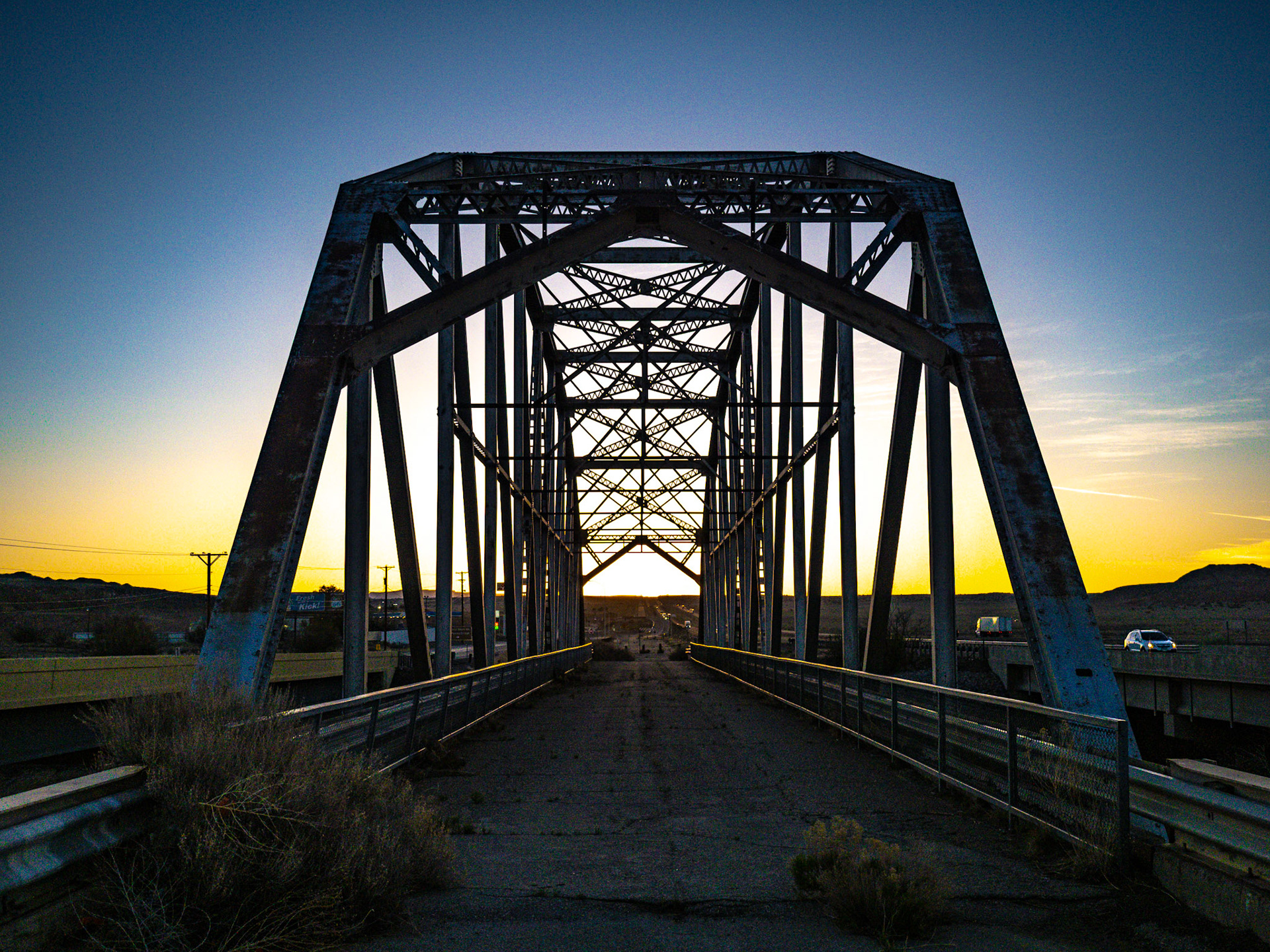 This old bridge, no longer in use, is along Route 66 just west of Albuquerque, NM. I've passed it a few time and thought, there's a picture there. I am not sure I found it yet. Here it is at sunrise.
