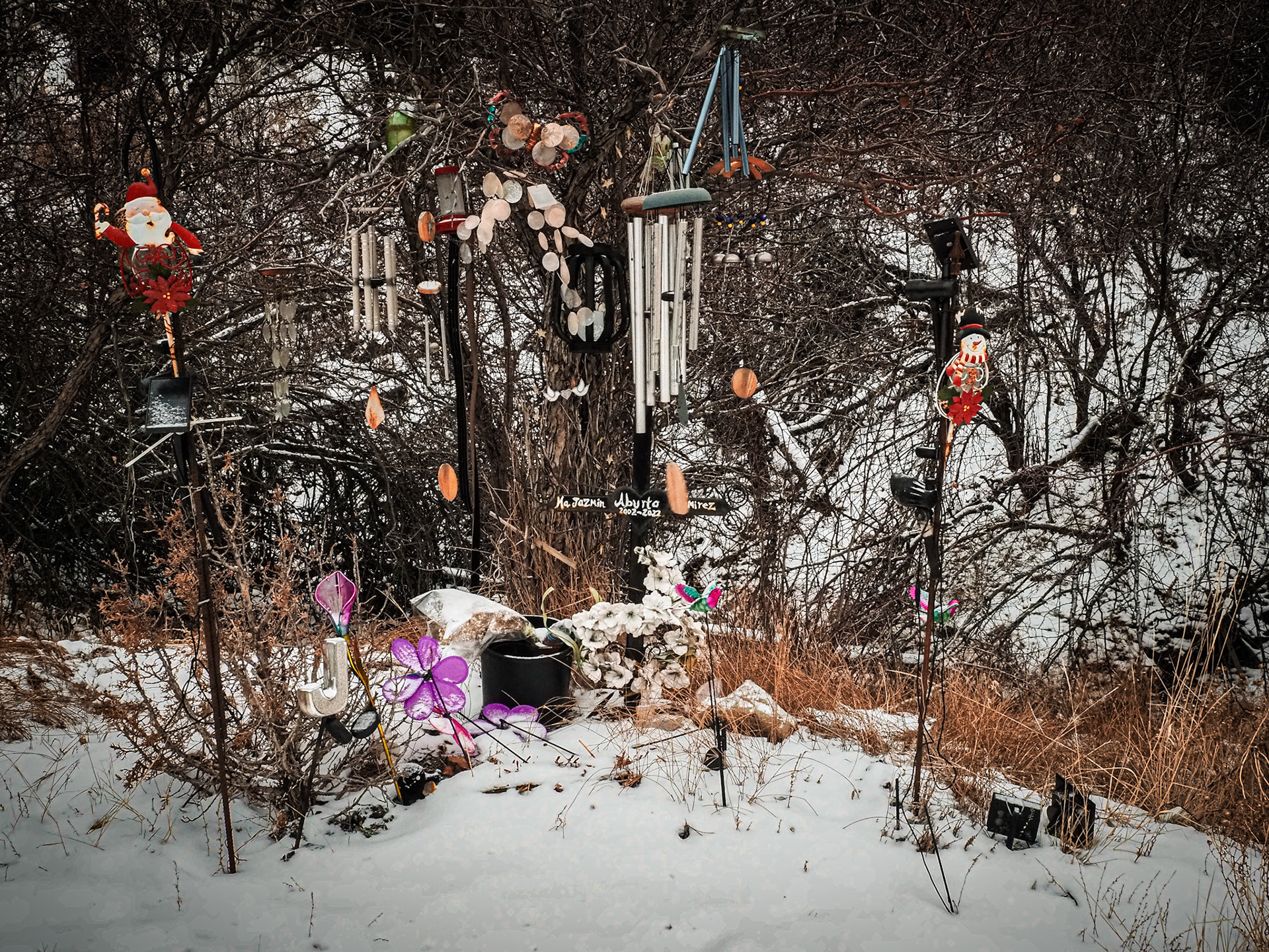 Another roadside memorial I found over the weekend. This one has a pretty busy background which made it a challenge to photograph. In situations like this, I'll focus on one element. But I felt I needed to capture the whole scene this time.