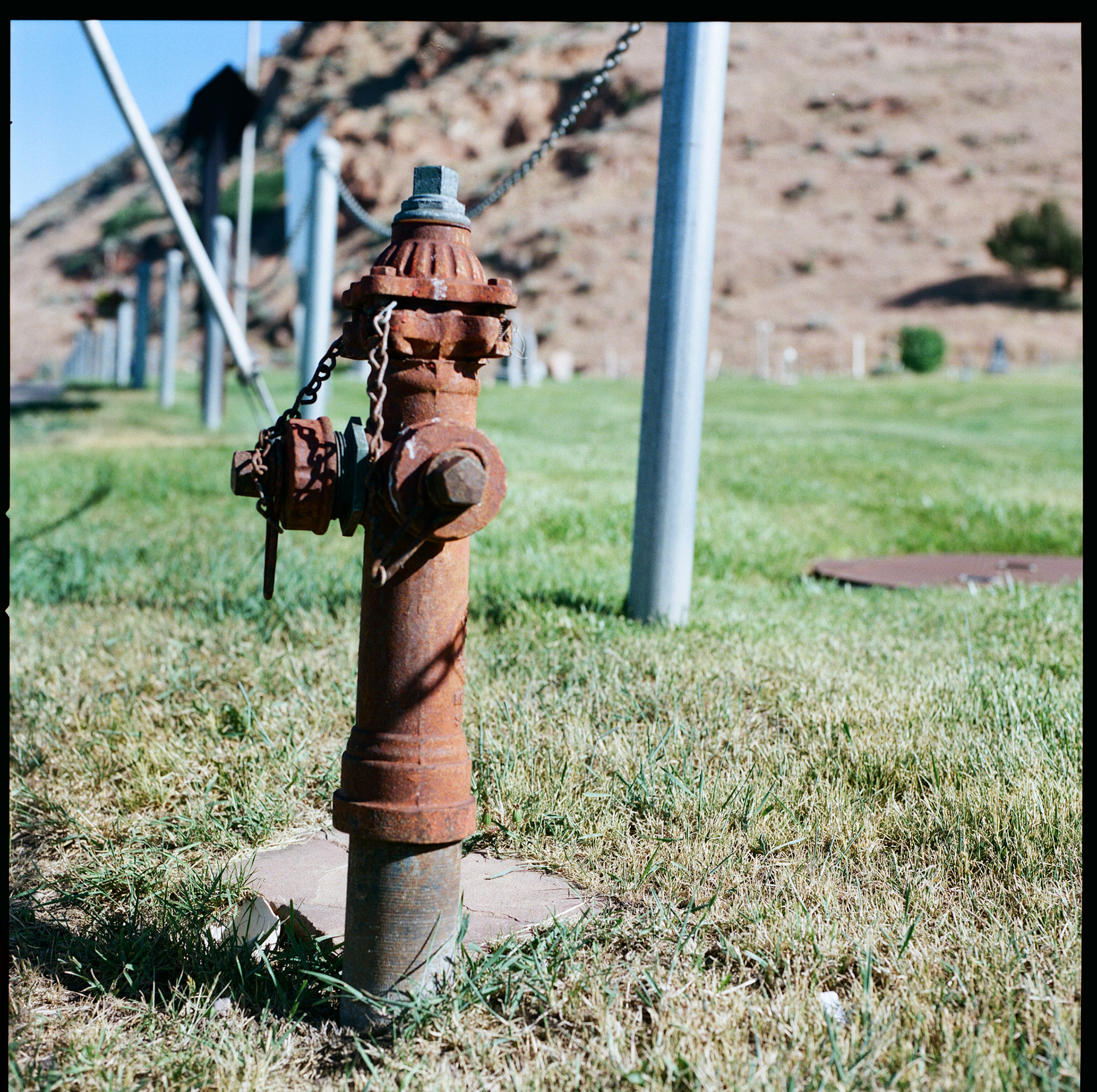 It's Analog Tuesday... This little guy is standing watch over the Peoa Cemetery.