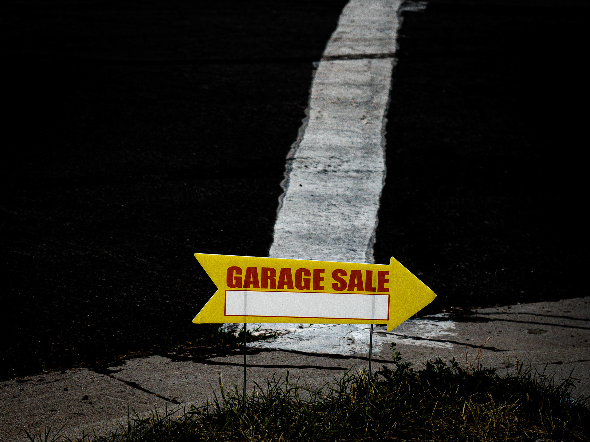 I saw someone on social media recently who was making picture of abandoned things. Thought I'd give it a try. An abandoned garage sale sign for you.
