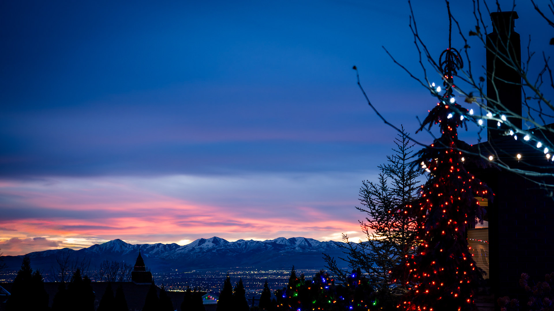 Christmas Lights, city lights and a sunset over the Oquirrhs.