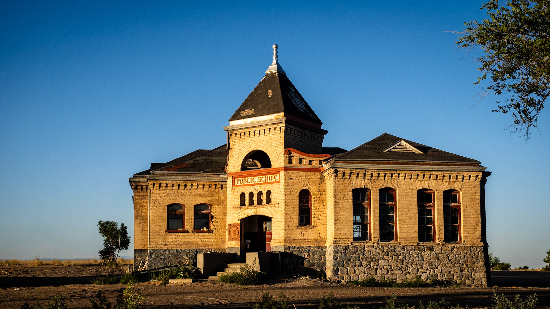 I got up way too early and went on a photo safari to central Utah today to capture a photo of this building, the Deseret Public School. Holy cow, what a beautiful old building.