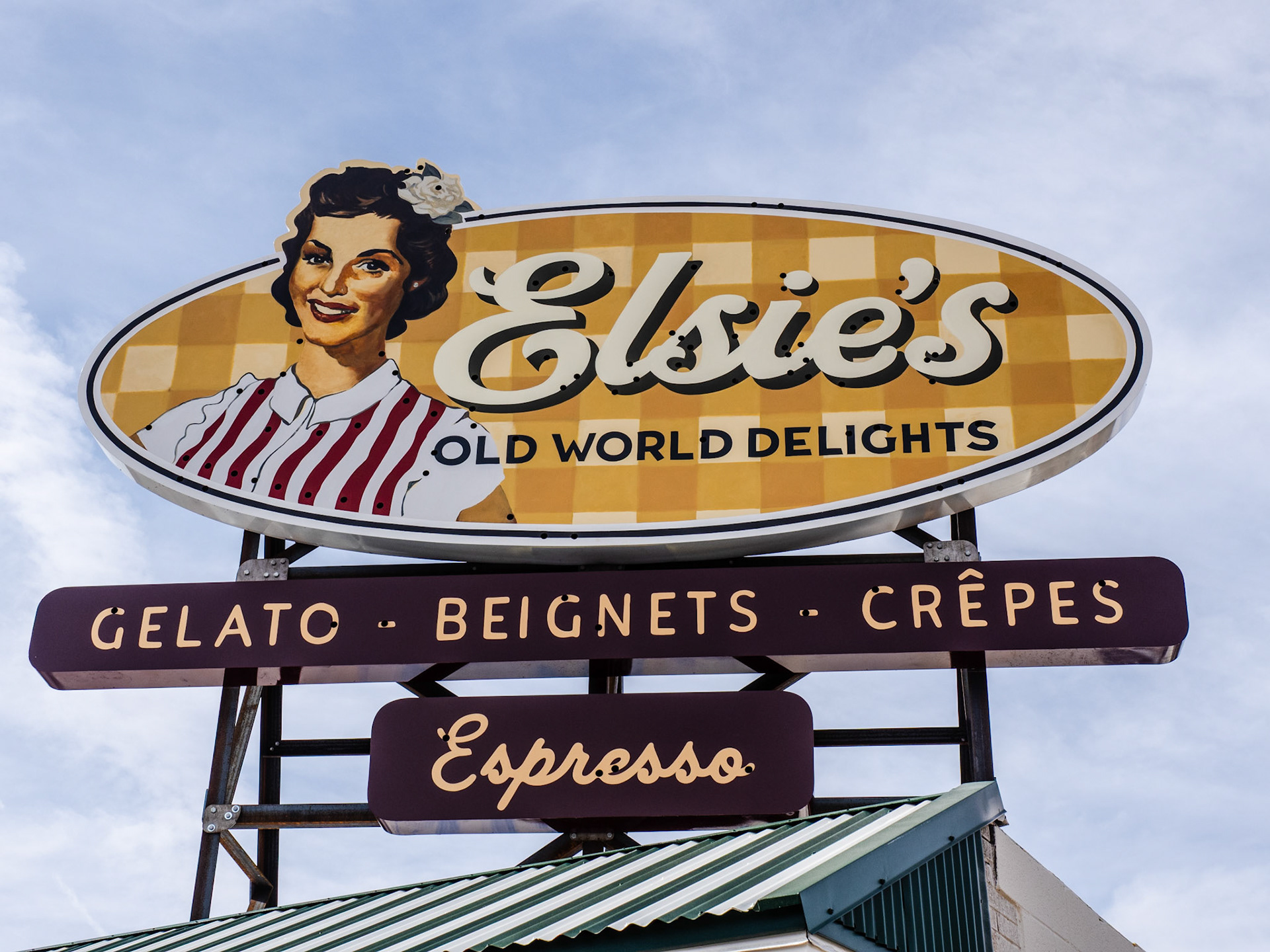 One of my favorite subjects are nostalgic signs. Some are newer, as Elsie's is while others are old and faded.