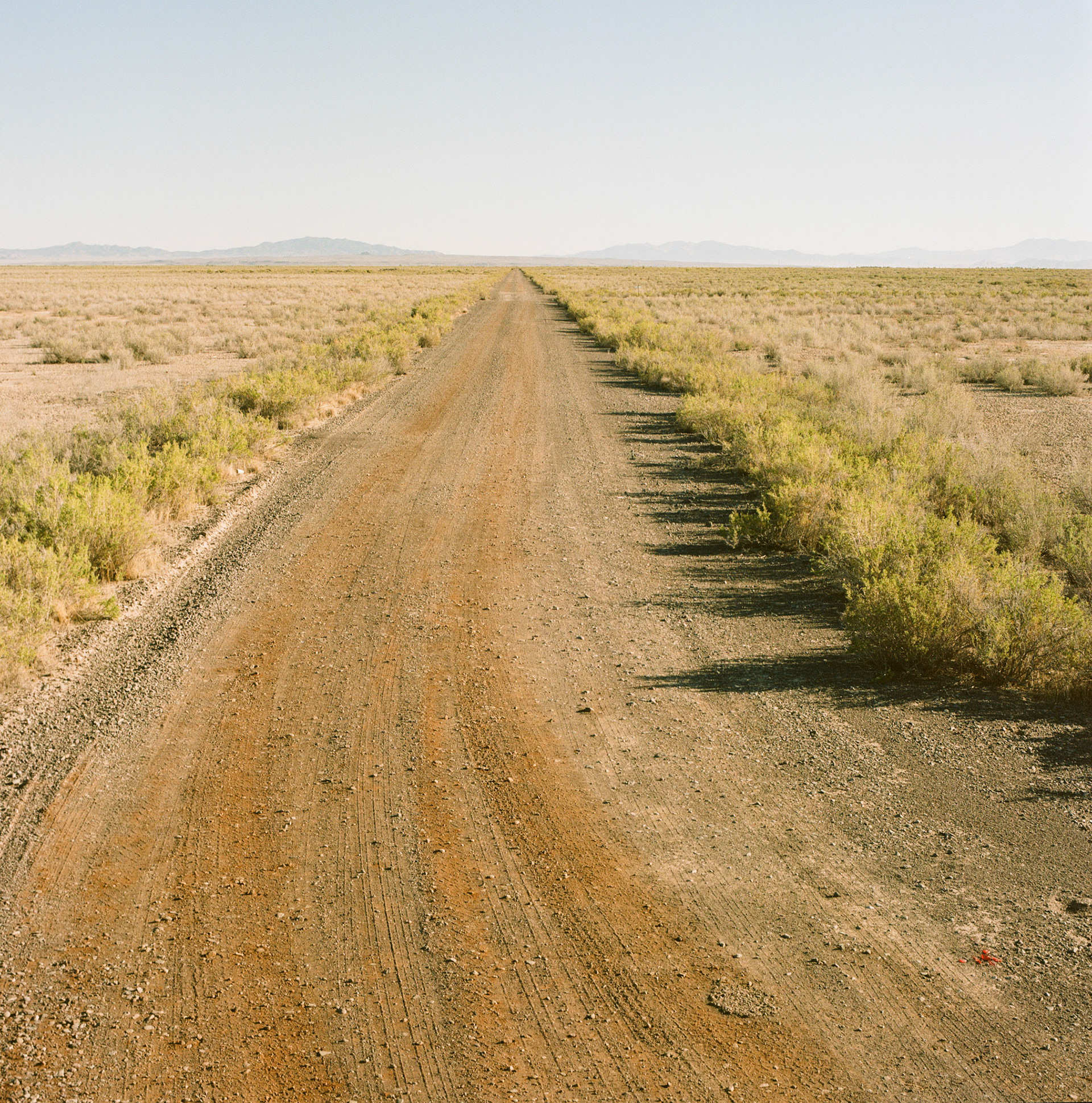 The Topaz Internment Camp living area covered a square mile or 640 acres. The peak incarcerated population was just over 8100. This is the western boundary road, a mile long.