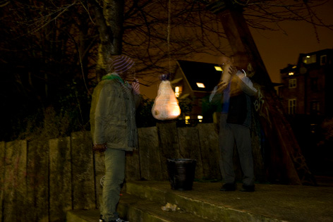Participants examining the speaking lanterns for clues