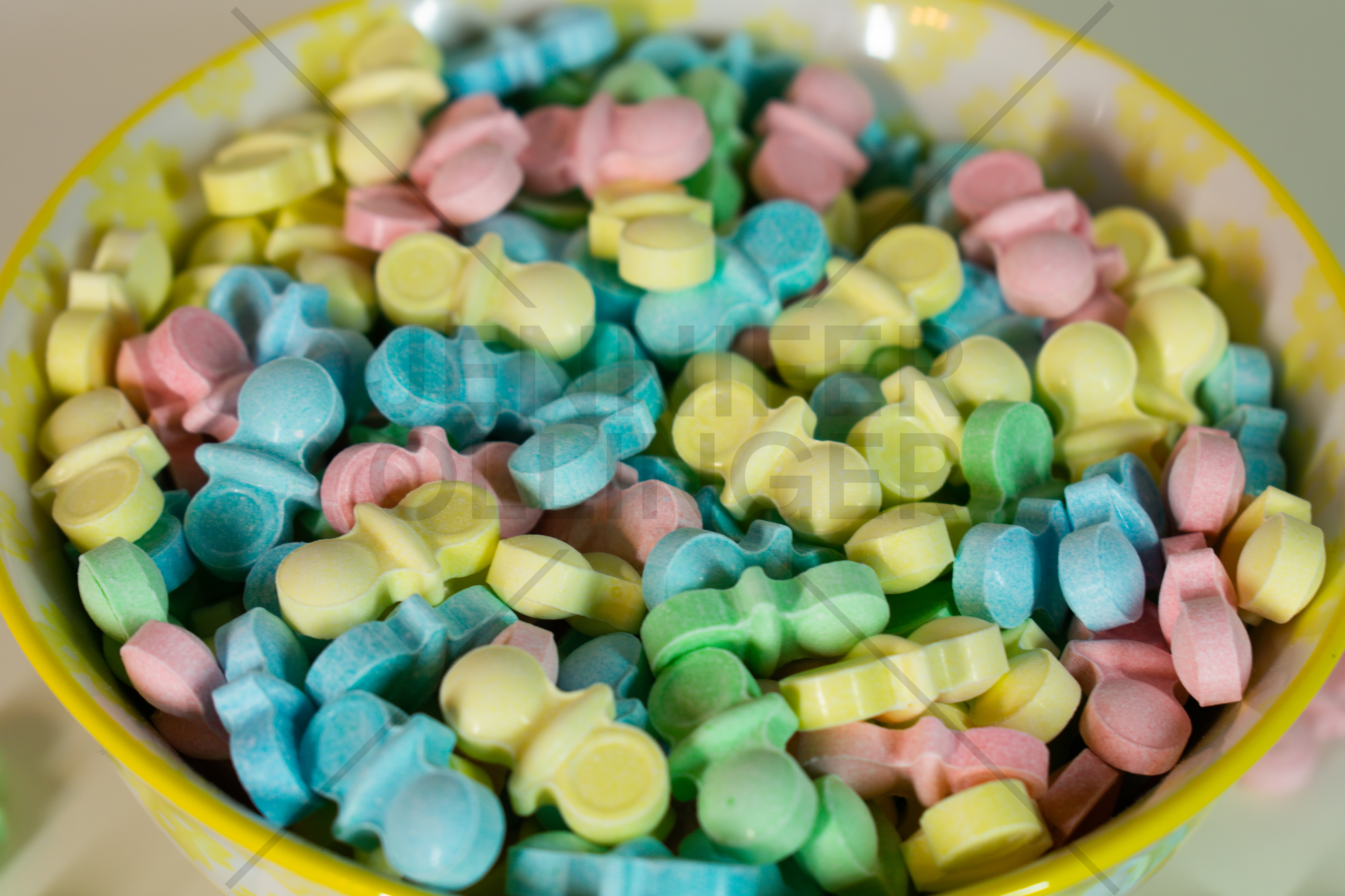 Lifestyle product photography featuring Sweet Tart Pacifiers styled in a bowl to emphasize texture, color, and serving inspiration for Amazon listings.