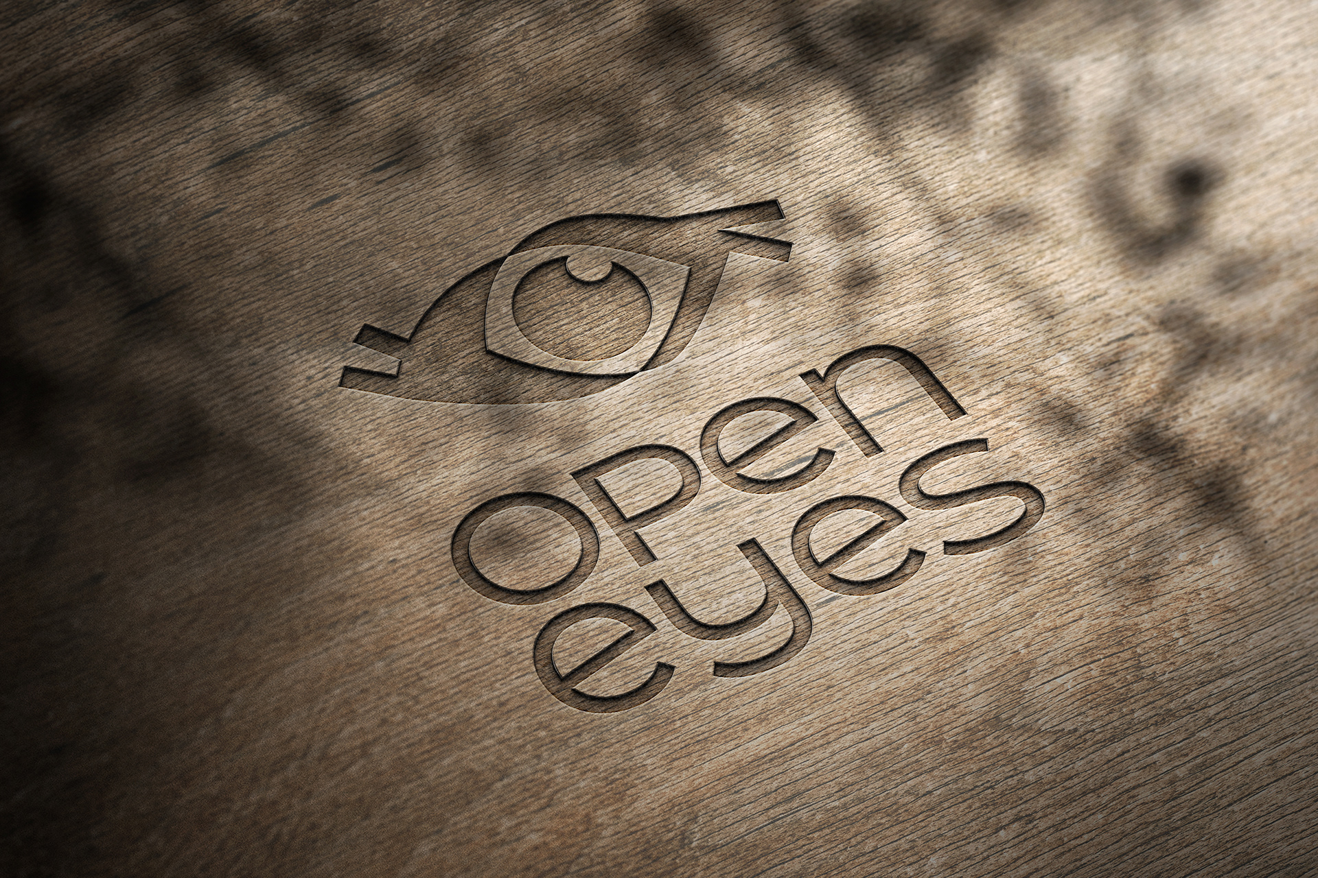 Logo als Holzprägung für Open Eyes Tierkommunikation von Stefanie Twellmann Grafik und Illustration, Hamburg