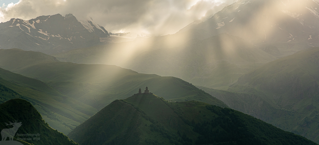 Gergeti Trinity Church at Stepantsminda (also called Kazbegi) after a rain shower