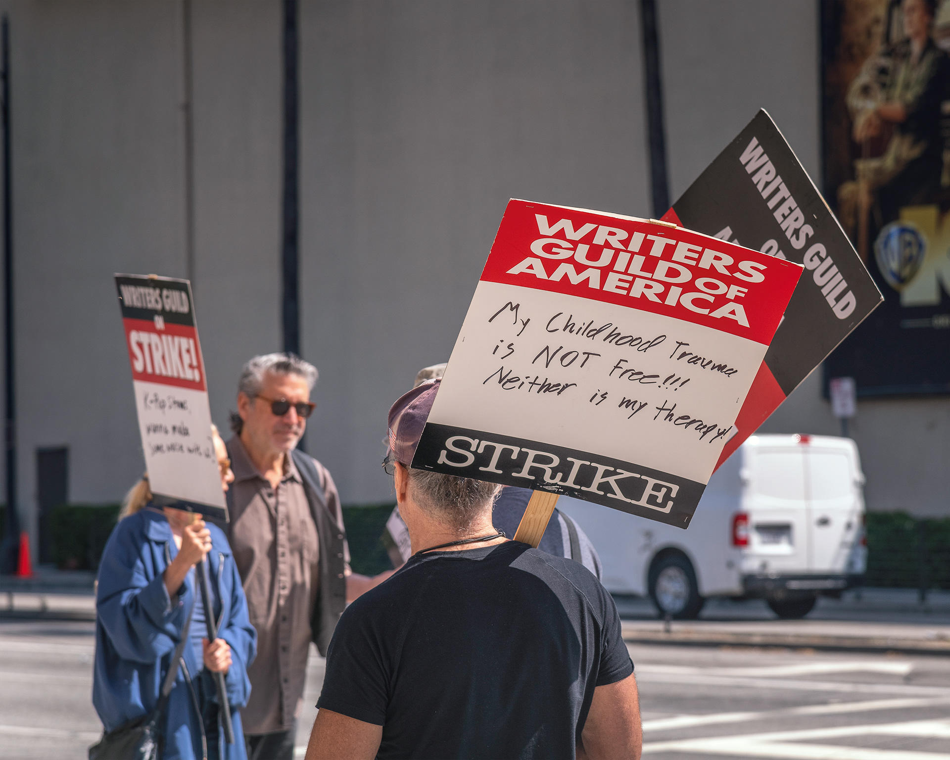 May 17, 2023 - Burbank, CA, USA: Members of the Writers Guild of America strike outside Warner Brothers studio in Burbank, CA.